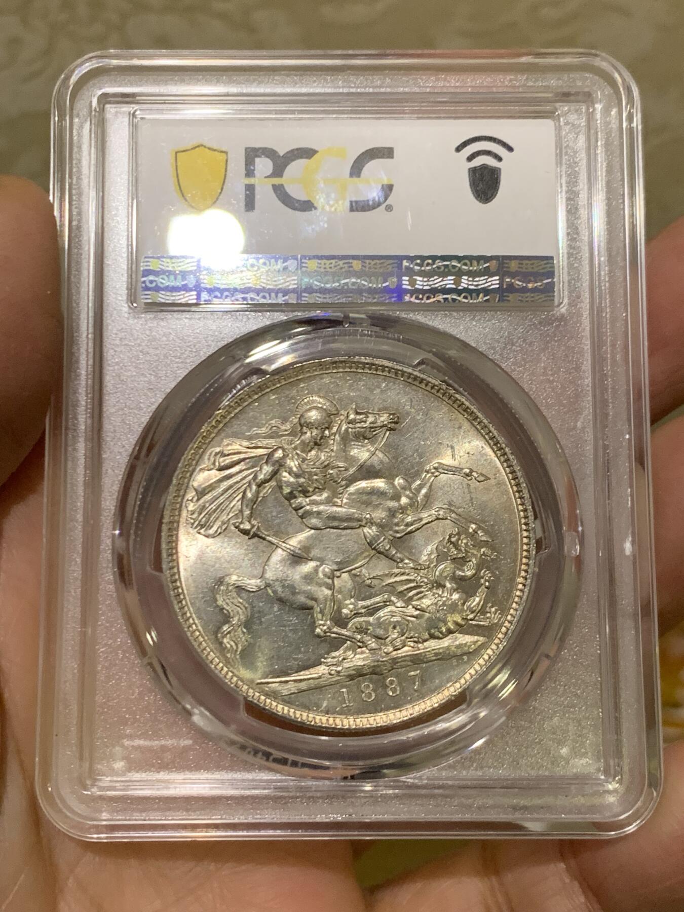 《竞宝斋》第454场 周日，周一 2场连拍 （全场包邮，欢迎送拍） PCGS MS63 英国1887年维多利亚女王高冠马剑1克朗银币