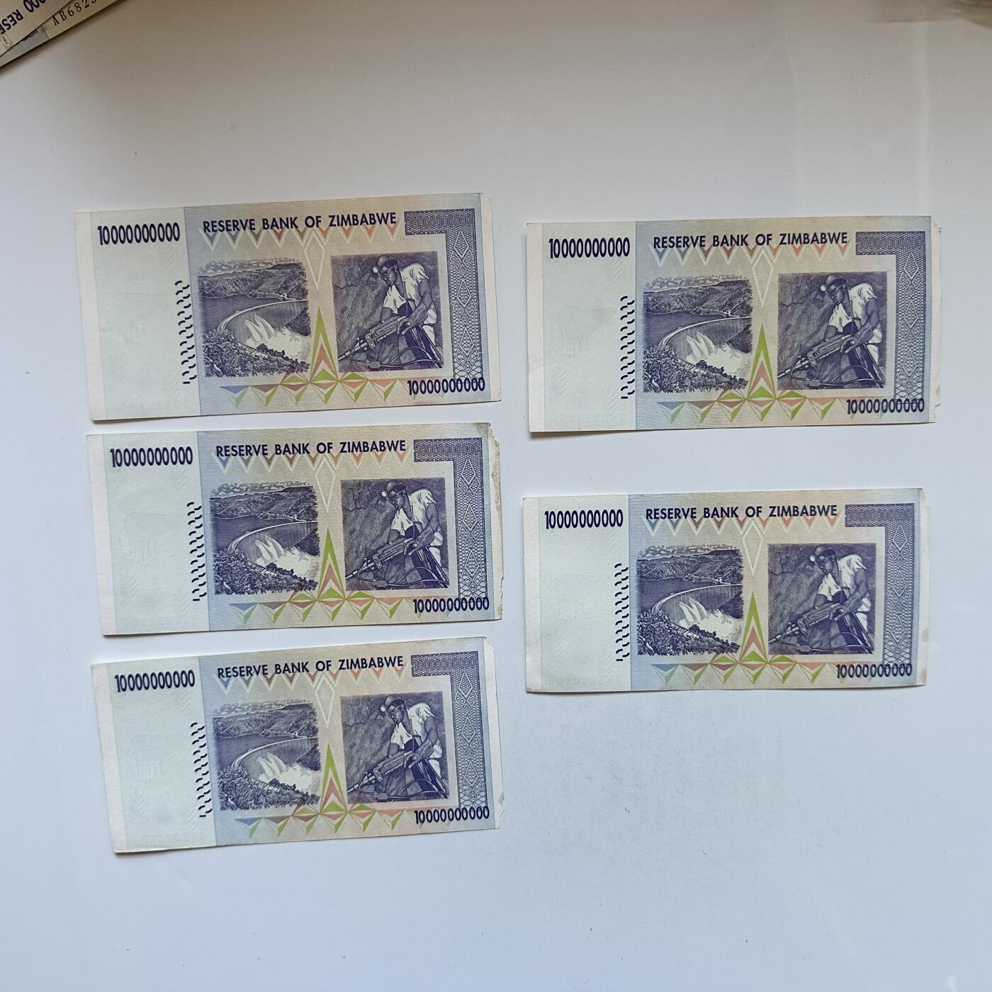 🌹外币初藏🌹🐯2026年第3场  每周二四六晚8️⃣点 接代拍 全新津巴布韦100亿纸币5张 10个0 边角有缺—5