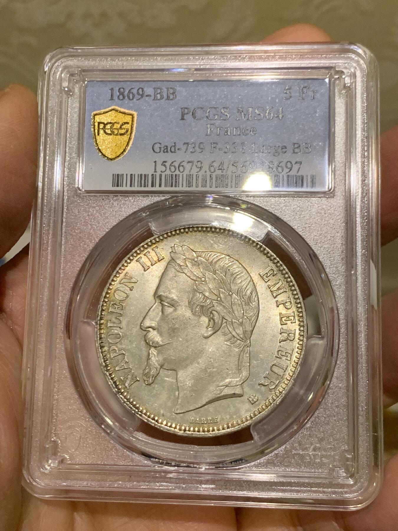 《竞宝斋》第454场 周日，周一 2场连拍 （全场包邮，欢迎送拍） PCGS MS64 法国1869年拿破仑三世五法郎大银币，BB厂斯特拉斯堡铸，比版本少见，年份相对也不错，出厂状态。