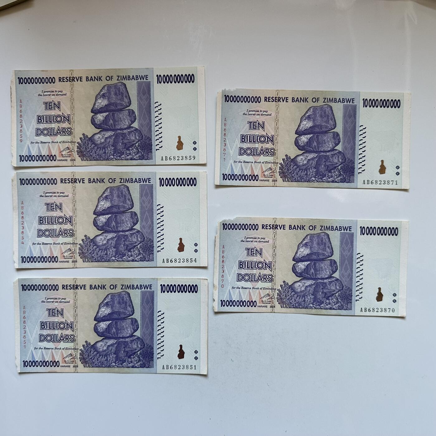 🌹外币初藏🌹🐯2026年第3场  每周二四六晚8️⃣点 接代拍 全新津巴布韦100亿纸币5张 10个0 边角有缺—4