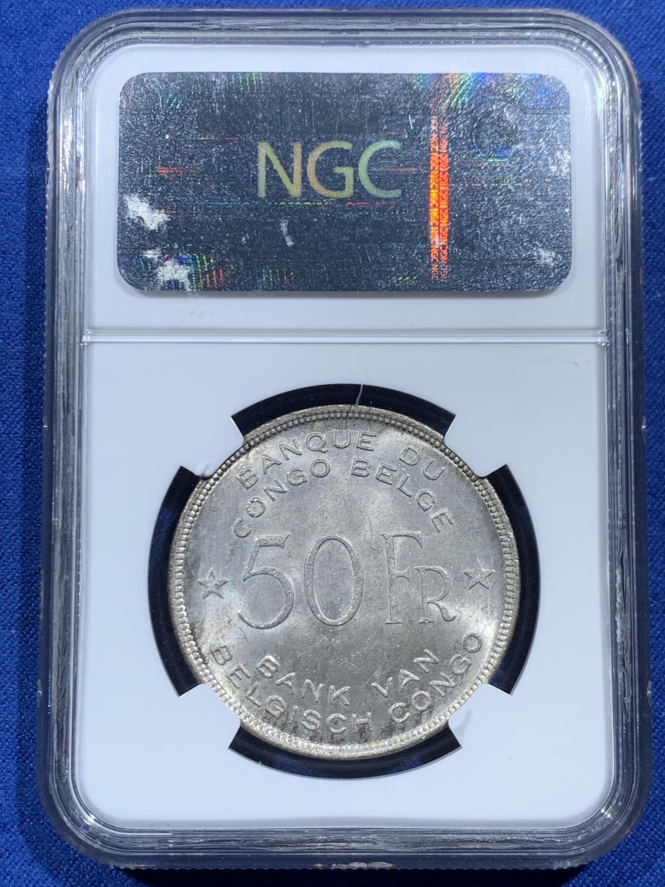 《竞宝斋》第454场 周日，周一 2场连拍 （全场包邮，欢迎送拍） NGC MS63 比属刚果1944年大象50法郎大银币，非洲名誉品，同分书价500美金。淡彩好状态，NGC老盒保障。殖民地经典主币，非洲象威武雄壮