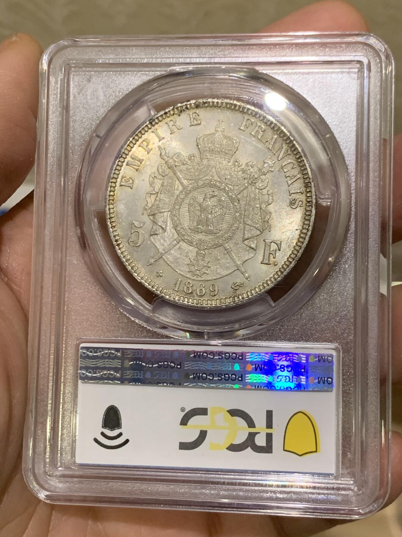 《竞宝斋》第454场 周日，周一 2场连拍 （全场包邮，欢迎送拍） PCGS MS64 法国1869年拿破仑三世五法郎大银币，BB厂斯特拉斯堡铸，比版本少见，年份相对也不错，出厂状态。