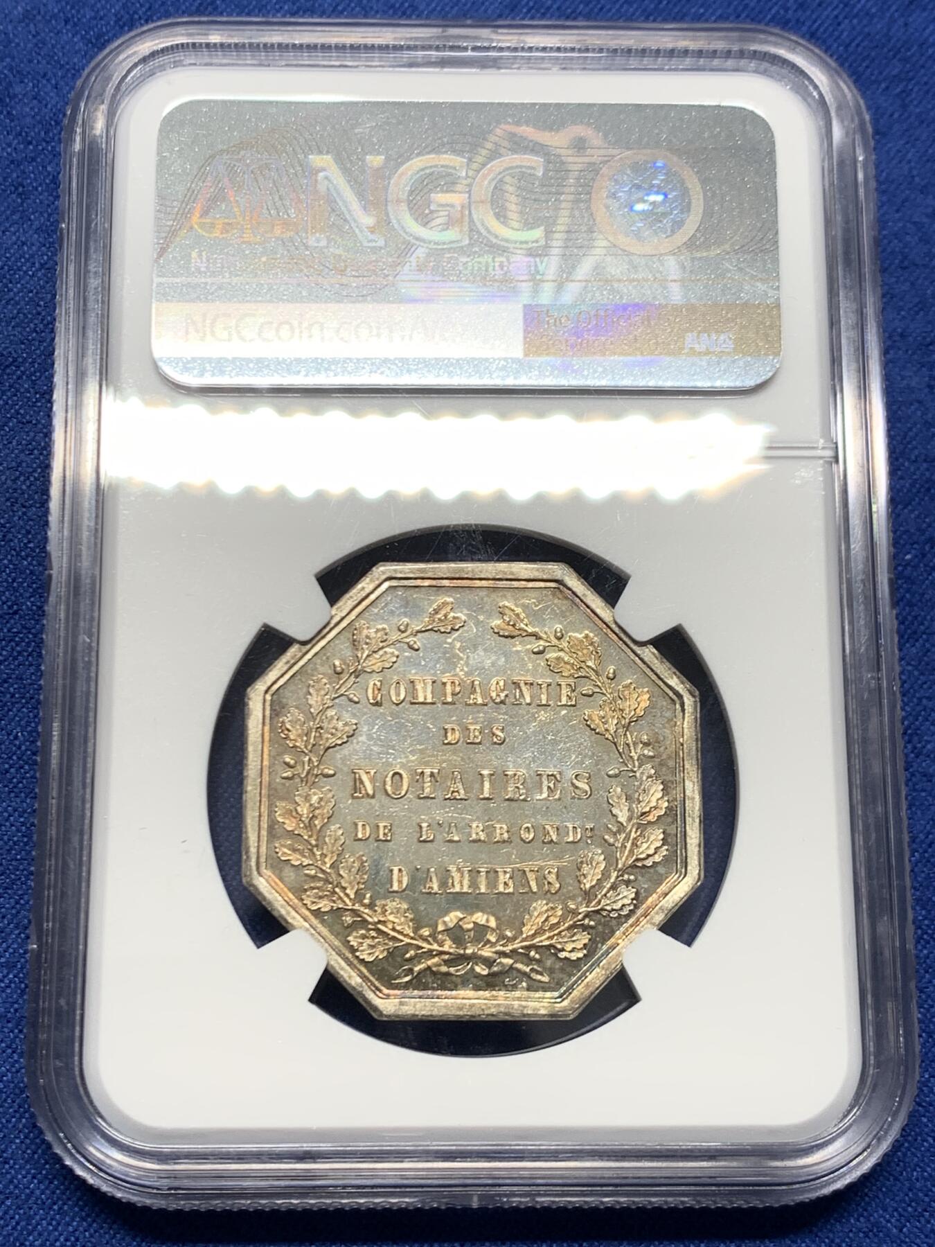 《竞宝斋》第454场 周日，周一 2场连拍 （全场包邮，欢迎送拍） NGC MS64 法国1854年亚眠公证处八角银质代币 PL底板 金色包浆 顶级品相状态