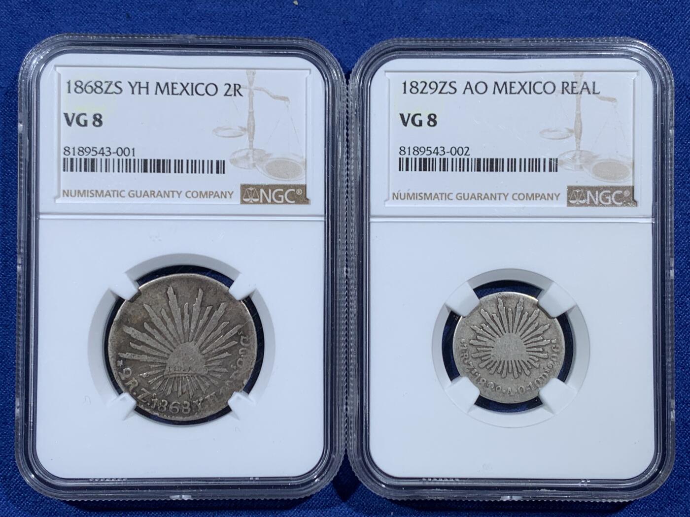 《竞宝斋》第454场 周日，周一 2场连拍 （全场包邮，欢迎送拍） 两枚一组 NGC VG8 墨西哥鹰洋辅币，辅币较主币数量少的多，一枚为ZS厂1868年2R银币，一枚为ZS厂1829年早期1R银币，出分不易，是为凑品种不二之选，还是N盒连号，收藏佳品，