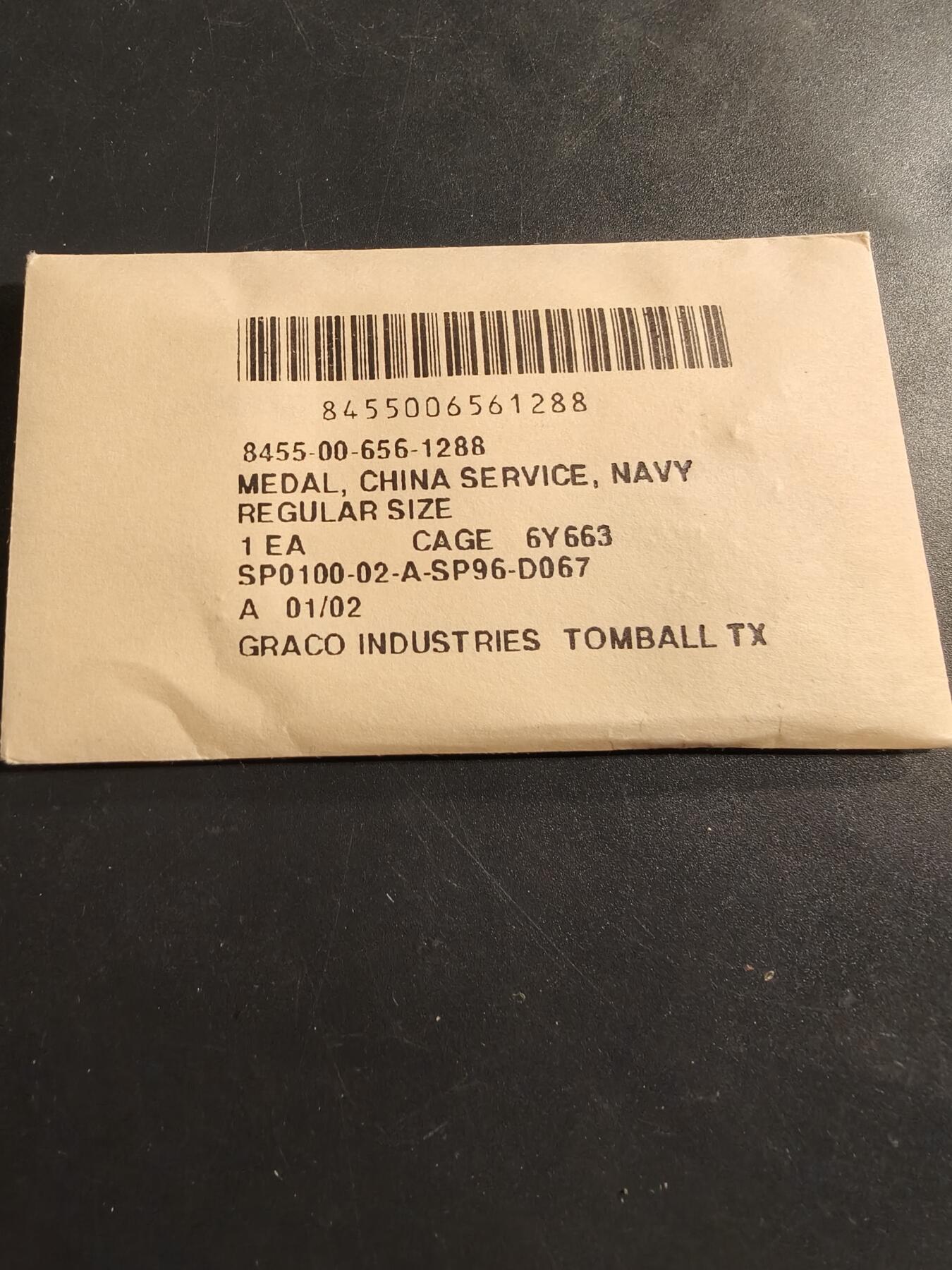 老王徽章第174期 美国海军二战中国服役奖章    原纸袋