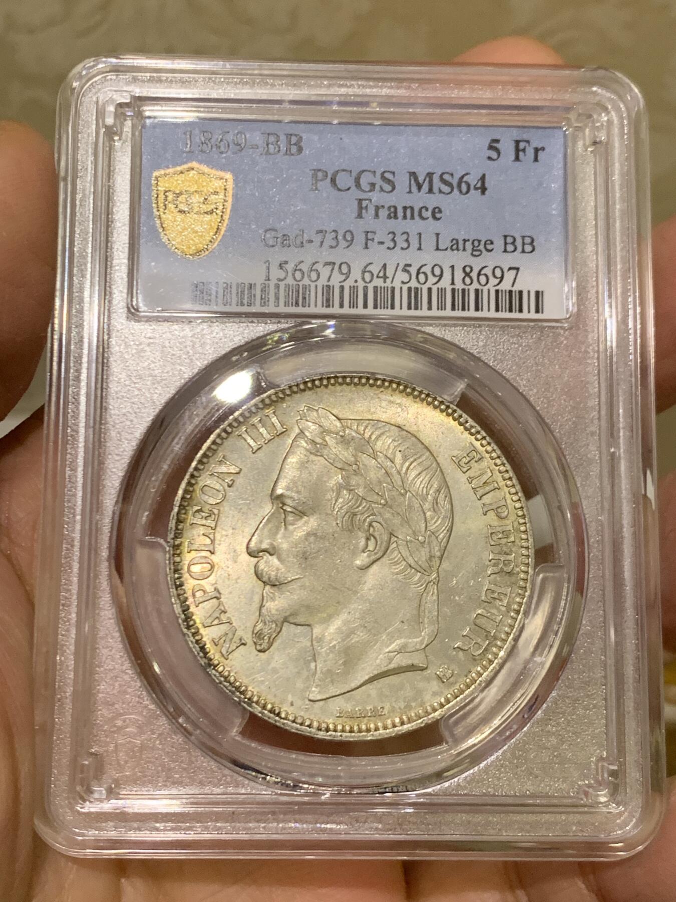 《竞宝斋》第454场 周日，周一 2场连拍 （全场包邮，欢迎送拍） PCGS MS64 法国1869年拿破仑三世五法郎大银币，BB厂斯特拉斯堡铸，比版本少见，年份相对也不错，出厂状态。