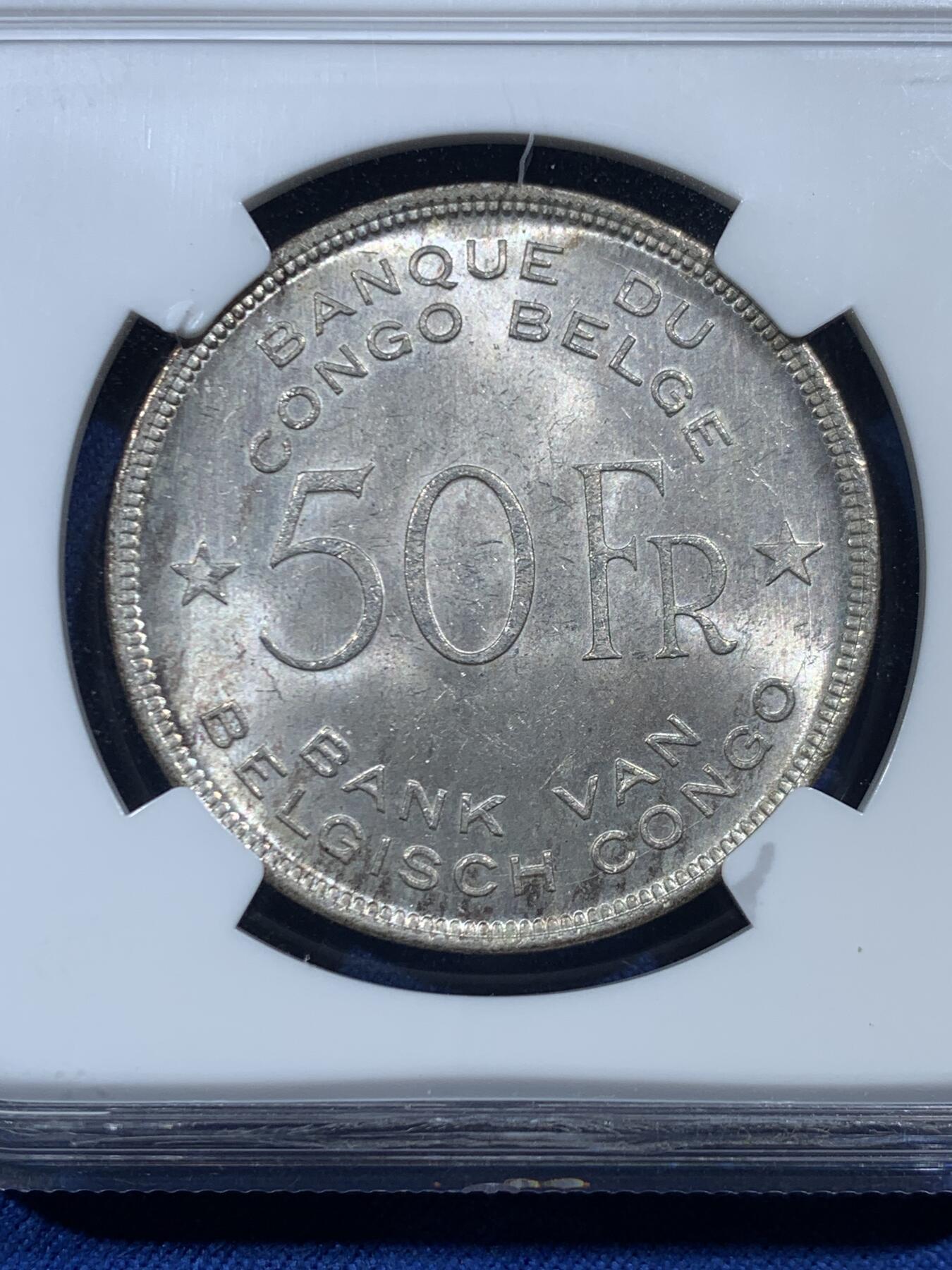 《竞宝斋》第454场 周日，周一 2场连拍 （全场包邮，欢迎送拍） NGC MS63 比属刚果1944年大象50法郎大银币，非洲名誉品，同分书价500美金。淡彩好状态，NGC老盒保障。殖民地经典主币，非洲象威武雄壮