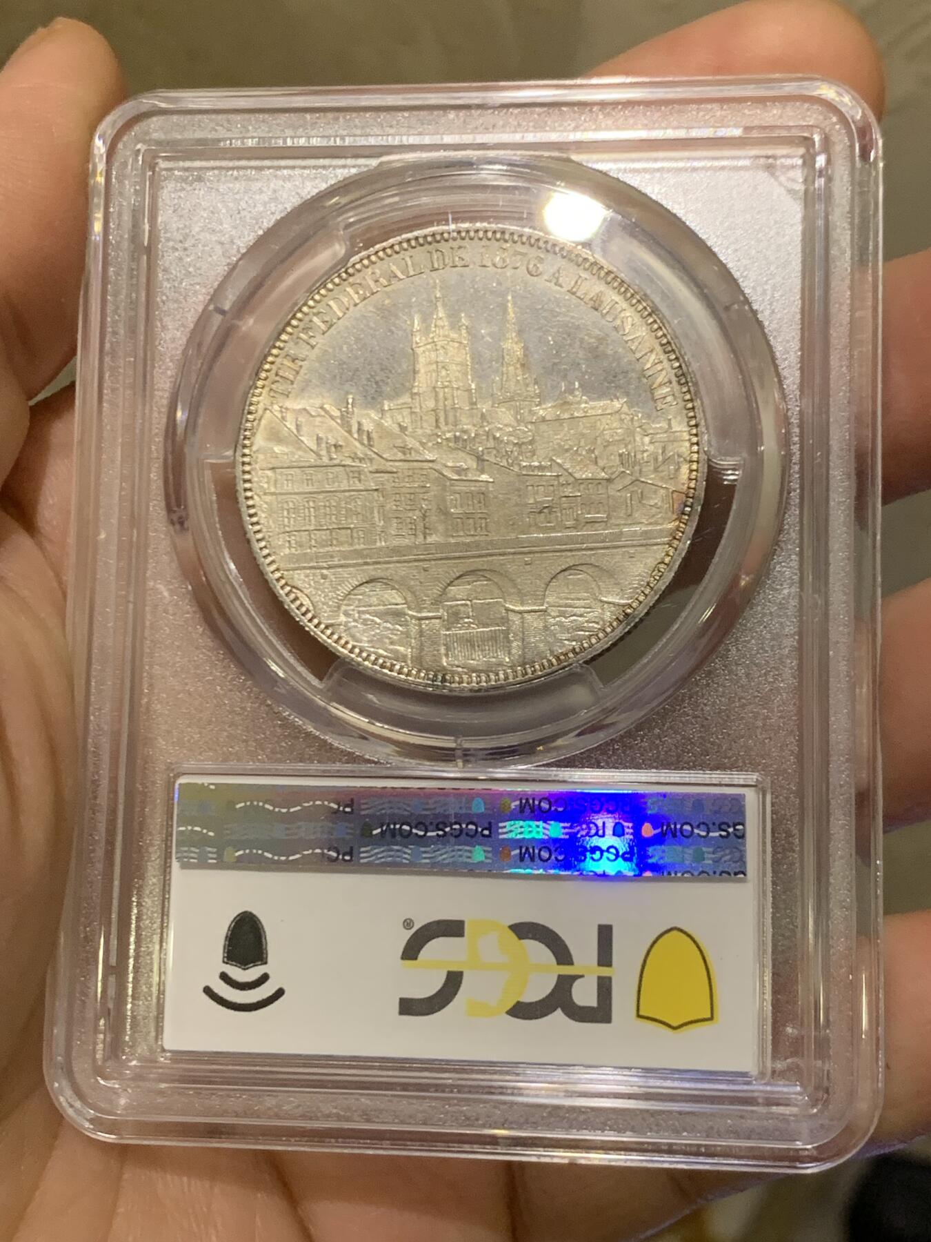 《竞宝斋》第455场 周日，周一 2场连拍 （全场包邮，欢迎送拍） PCGS MS63 瑞士1876年洛桑射击节大银币，设计最漂亮的射击节之一，背面为火热的城市景观。63中的佼佼者。