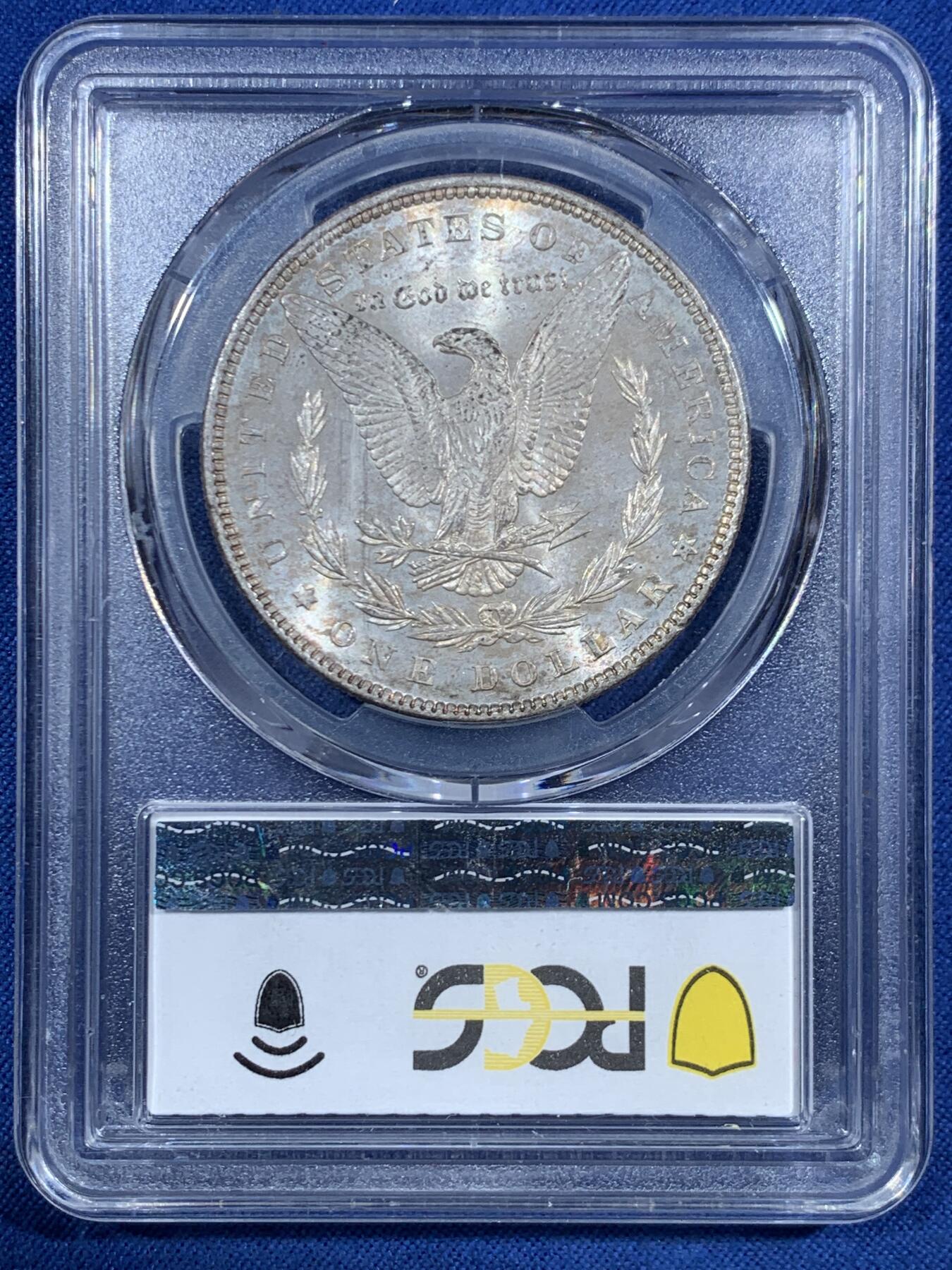《竞宝斋》第455场 周日，周一 2场连拍 （全场包邮，欢迎送拍） PCGS MS65 美国1898年摩根一美元银币，1898年年份较少，本枚为标准卷首彩，美轮美奂，绚丽五彩，值得重新送评