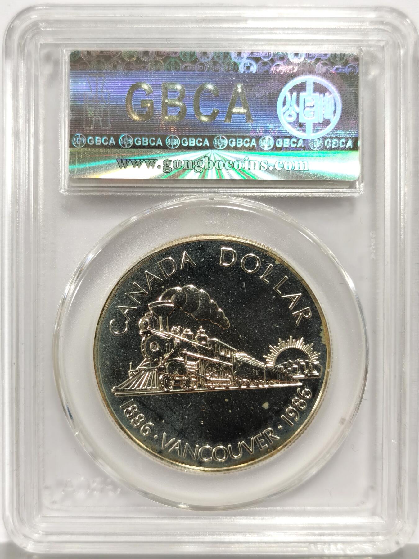 博洋堂世界钱币拍卖第156期（全场包邮） 公博 MS66 加拿大联邦1986年加拿大铁路通车100周年1元纪念银币，纪念 1886 -1986年温哥华建市、加拿大横贯大陆铁路通车 100 周年，加拿大近代化的重要标志，温哥华也因铁路通车成为西海岸核心城市。