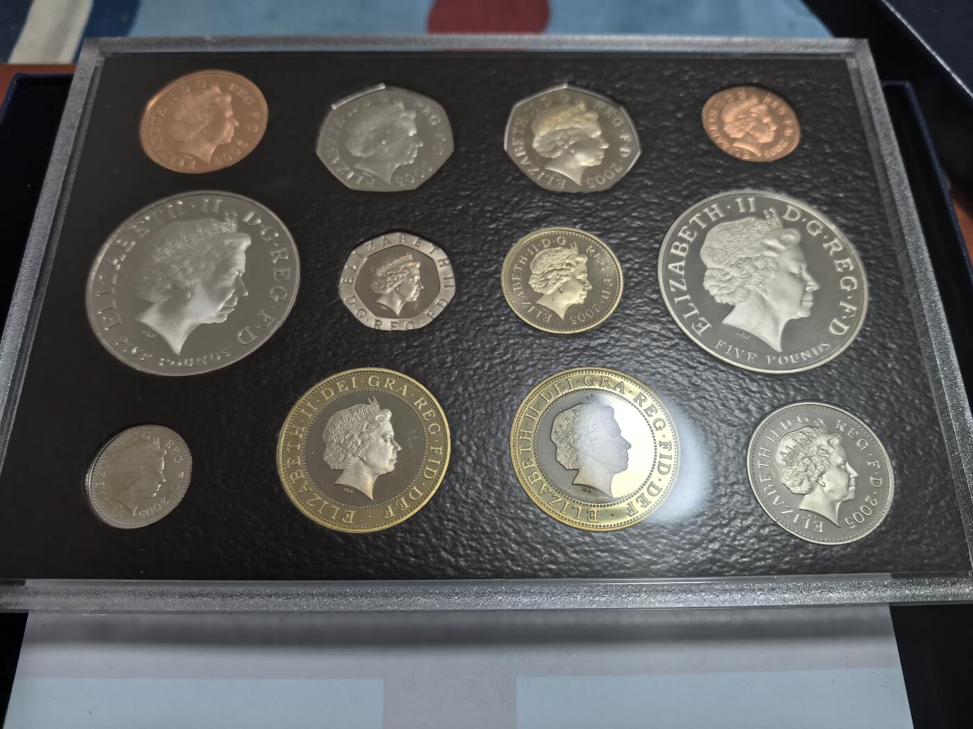 长老汇蛇年精选第九十二场拍卖 2003英国12枚标准精制套装，盒证全，含买家所有原纸