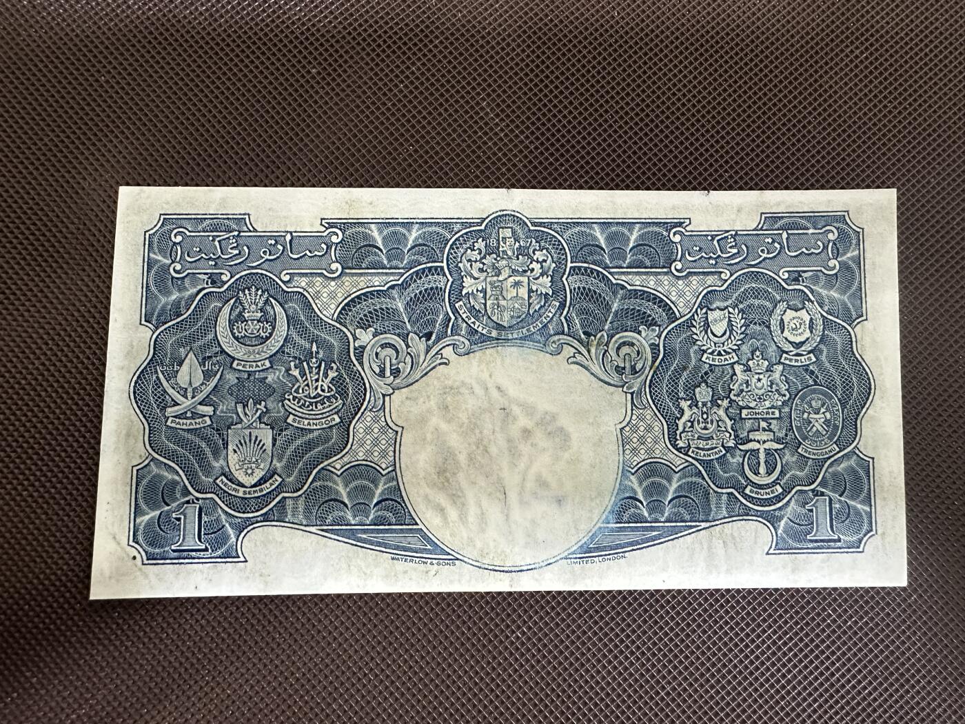 喜羊羊钱币收藏2025第12期(流通品相场) 	马来亚	P-11 1941年1元	品相如图			C/3 097360			