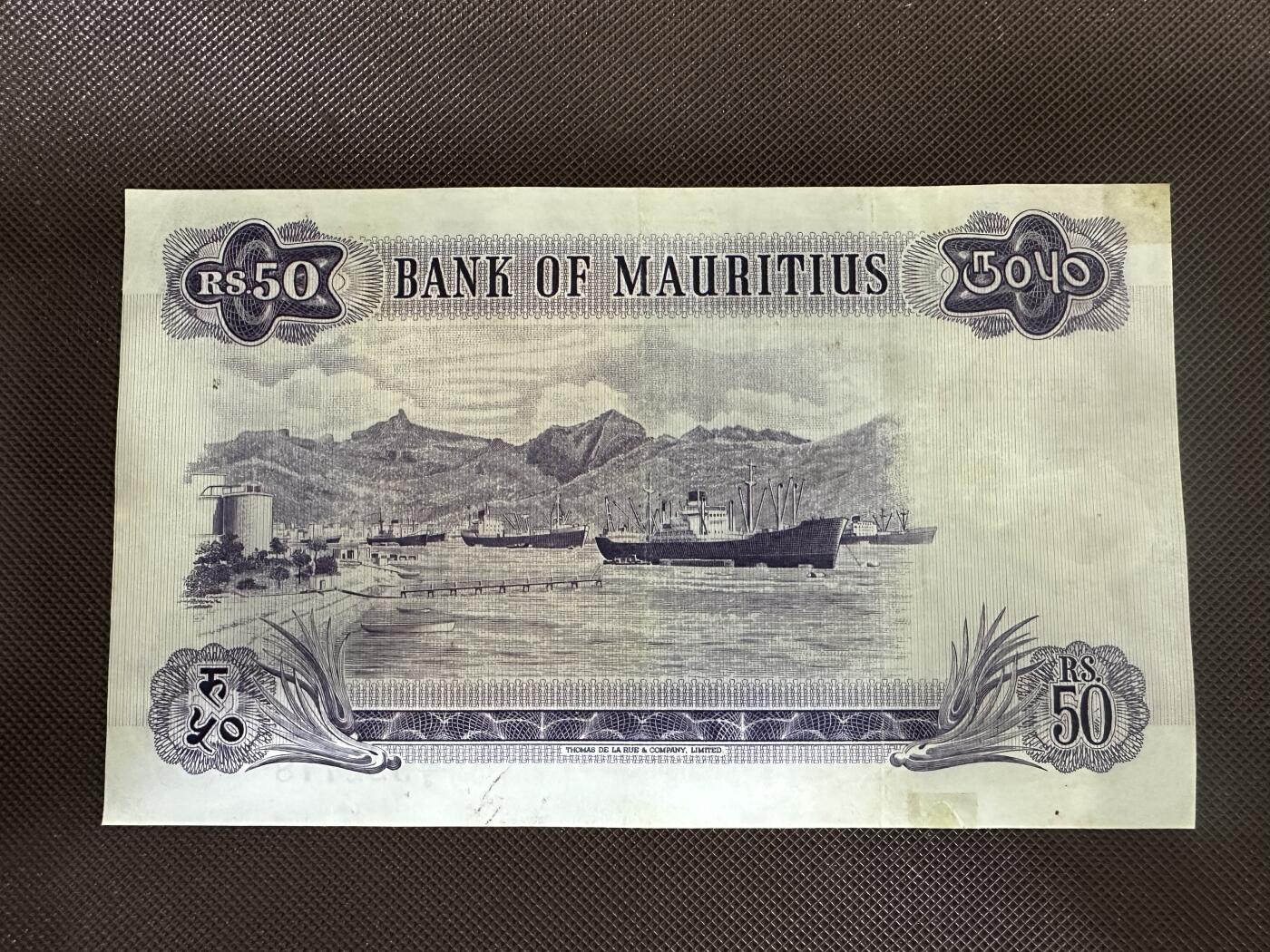 喜羊羊钱币收藏2025第12期(流通品相场) 毛里求斯	P-33c 1967年50卢比		品相如图				A/8 522778			