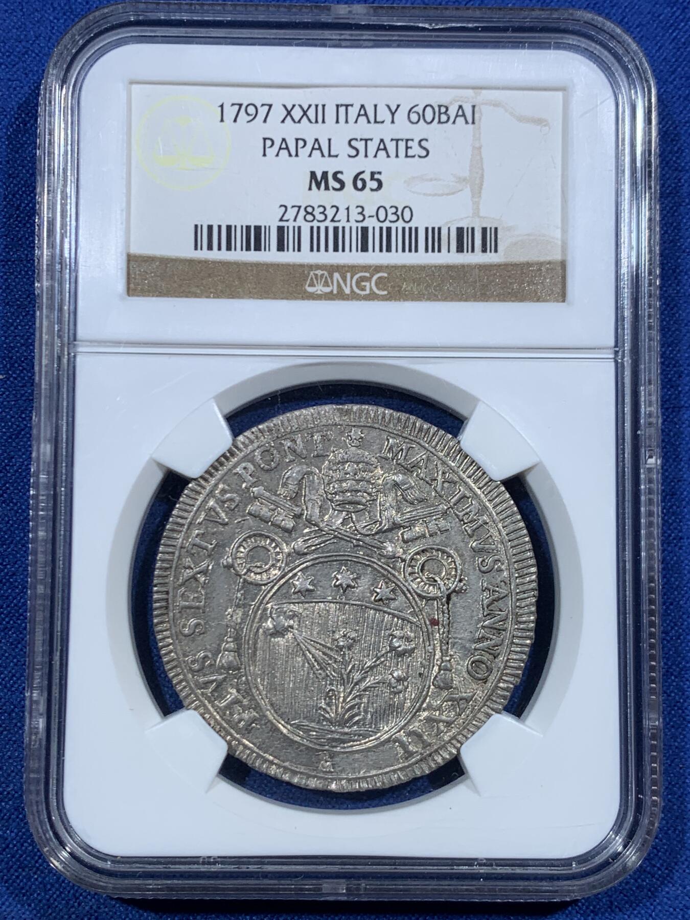 《竞宝斋》第455场 周日，周一 2场连拍 （全场包邮，欢迎送拍） NGC MS65 意大利1797年教皇国60B银币，庇护六世时期发行。整枚币全深打，小牧徽面的人头和植物所有细节完全展现，极其难得。银光闪闪的出厂状态。一枚直接一步到位。