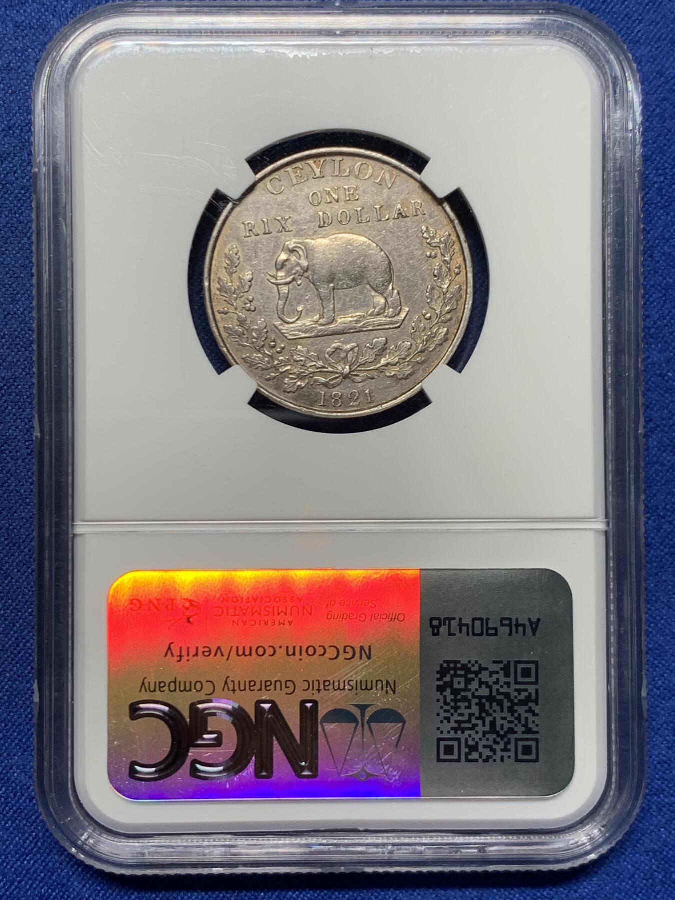 《竞宝斋》第455场 周日，周一 2场连拍 （全场包邮，欢迎送拍） NGC AUD 英属锡兰（斯里兰卡） 1821年 1立克斯 银币 正面为乔治四世肖像 细节很好 少见品种