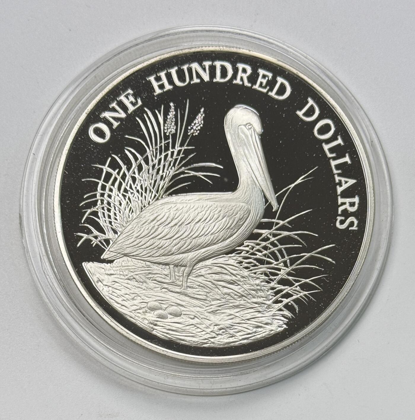 S&S Numismatic世界钱币-拍卖 第118期  圣文森特和格林纳丁斯1988年 热带鸟类系列-鹈鹕 100元精制纪念银币 129.59克925银 品相如图