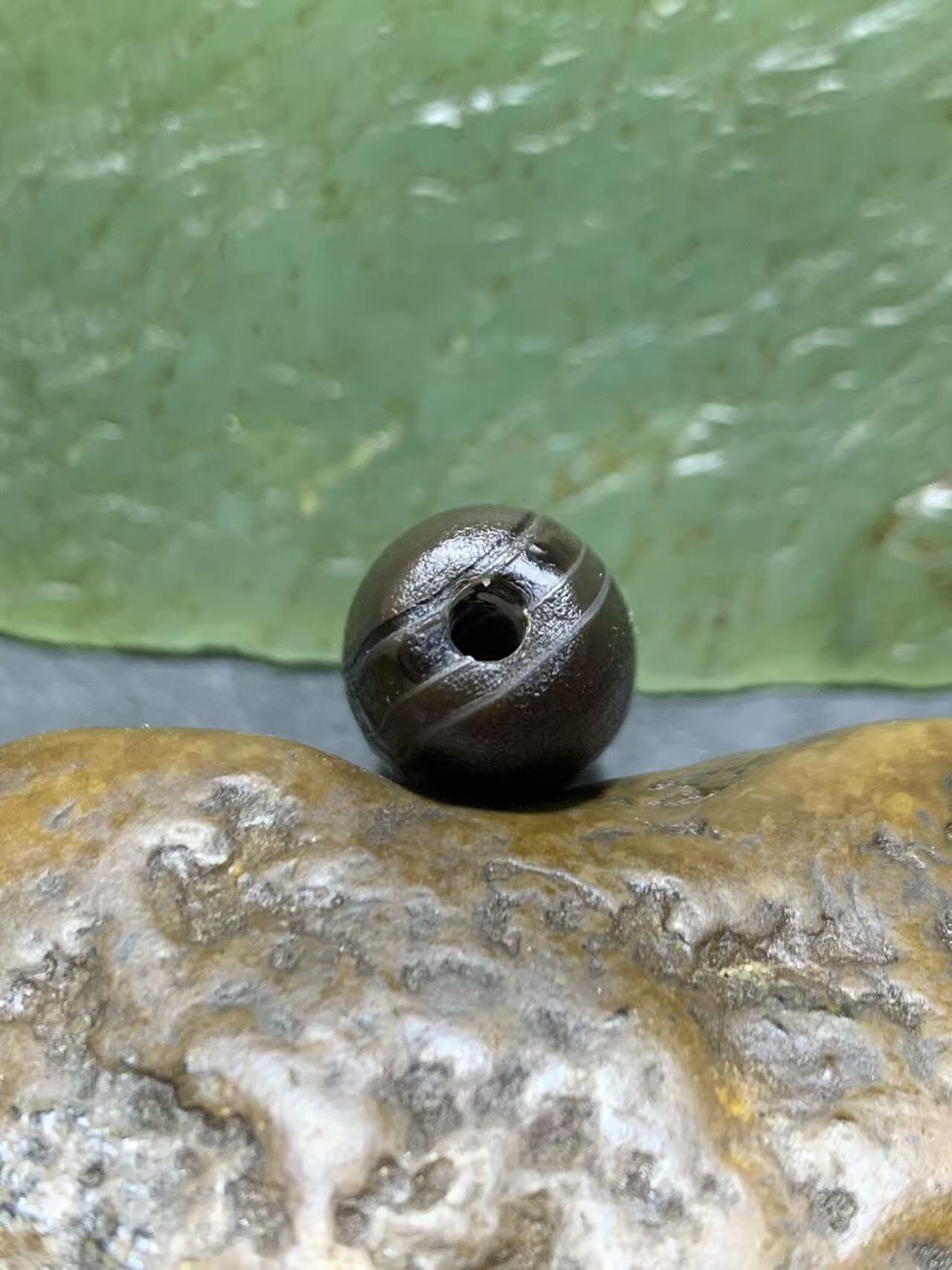 药师玛瑙风化纹随形桶珠一个