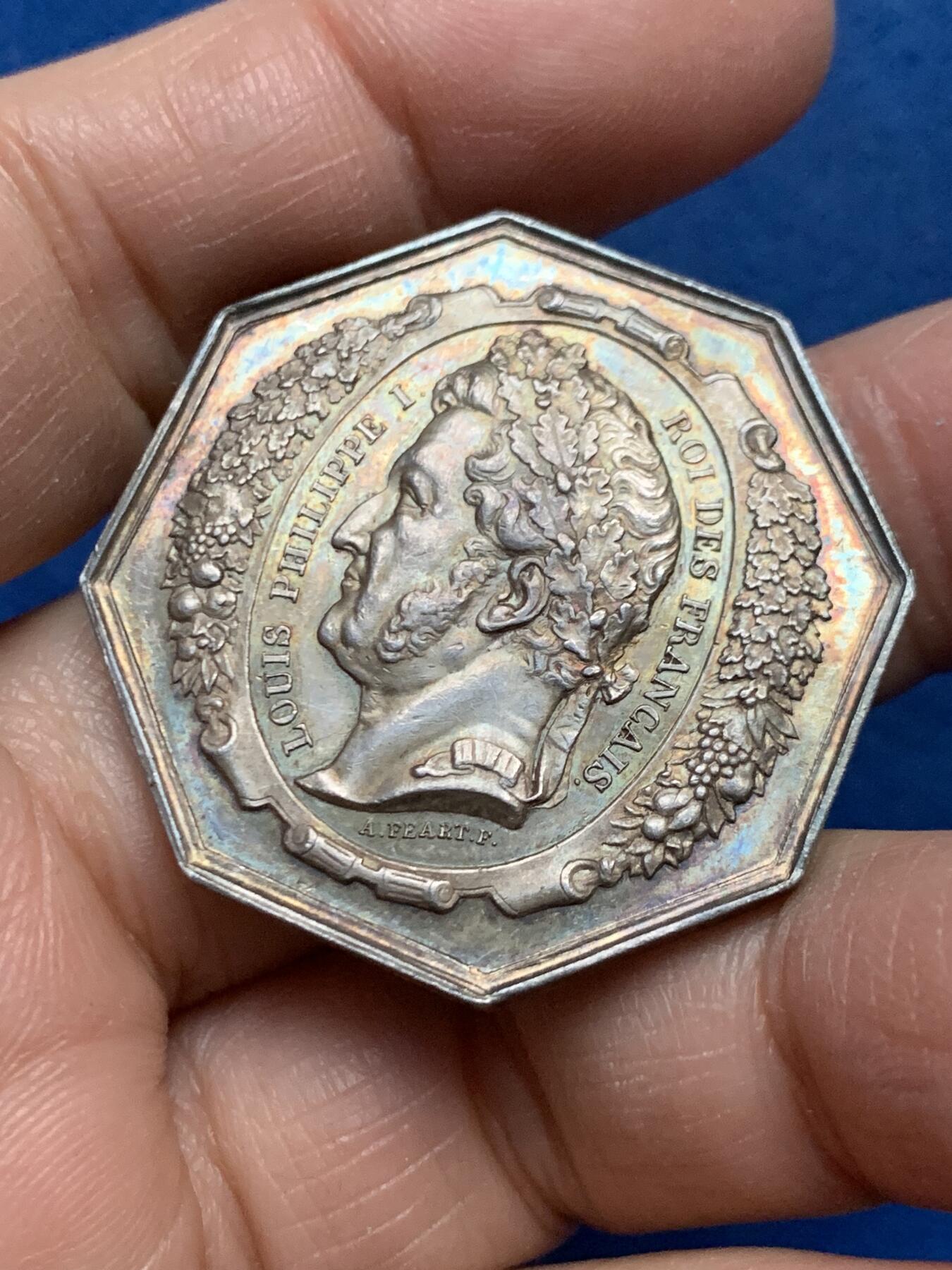 《竞宝斋》第455场 周日，周一 2场连拍 （全场包邮，欢迎送拍） 法国1844年菲利普一世头像菲尼克斯人寿保险八角银质代币，36MM，23.9克，手指边铭，五彩包浆