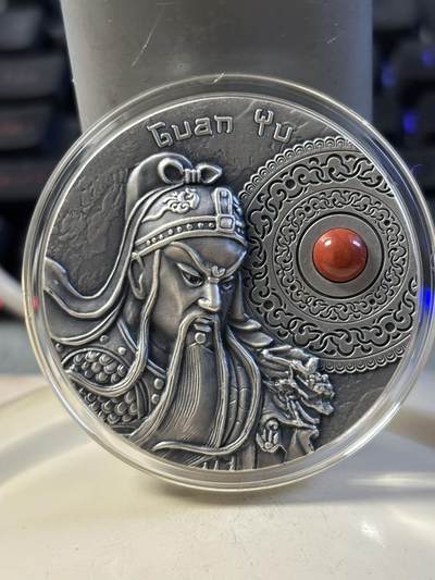 第187期拍卖 - 纽埃2021年中国龙虎将(1)-(战神)关羽,2盎司超高浮雕仿古镶嵌珊瑚红玉银币。62.2克，发行500枚