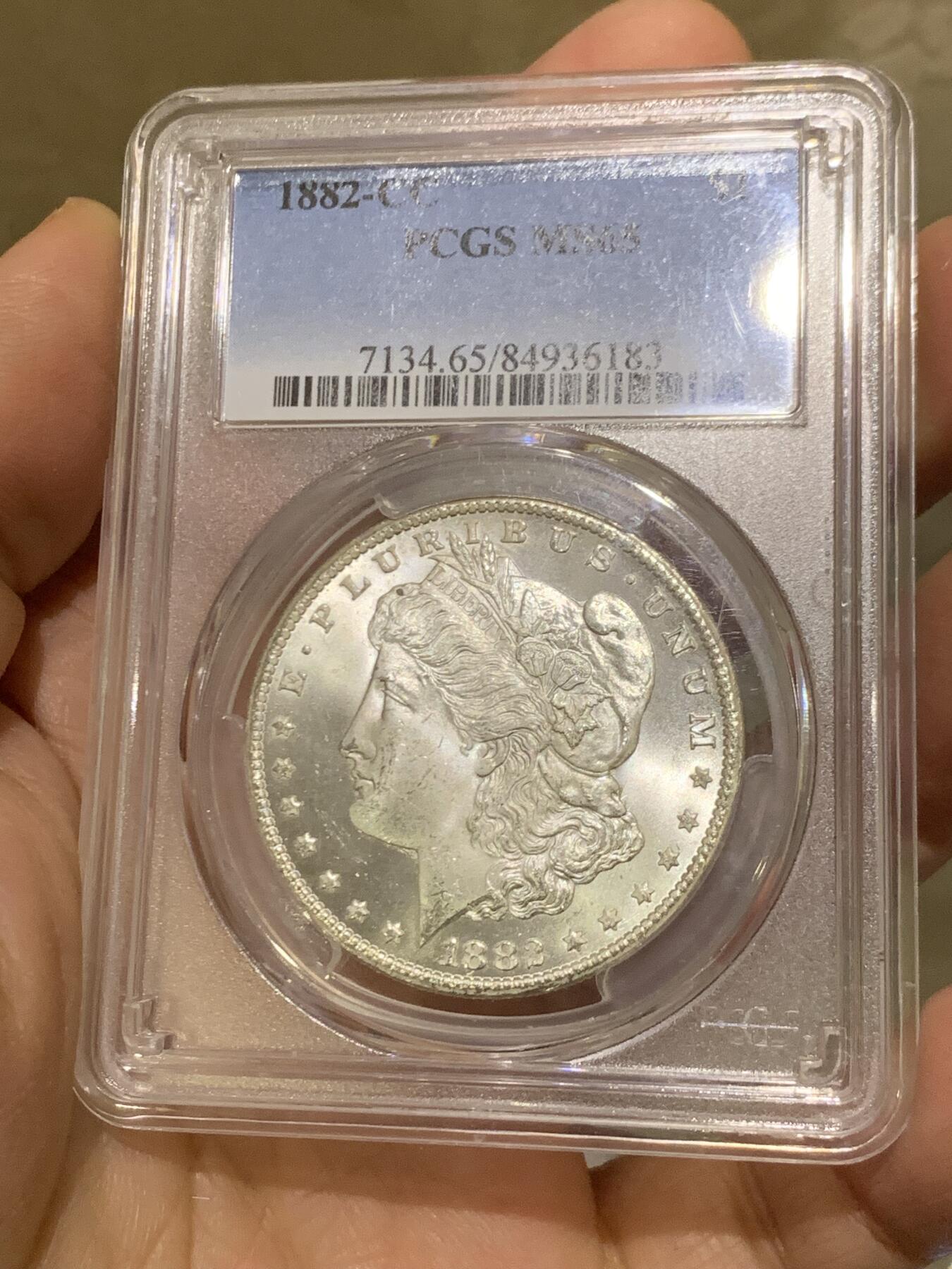 《竞宝斋》第455场 周日，周一 2场连拍 （全场包邮，欢迎送拍） PCGS MS65 美国 1882 CC 摩根 银币 卡森厂 高分难得 十字转光 背面支撑有磕