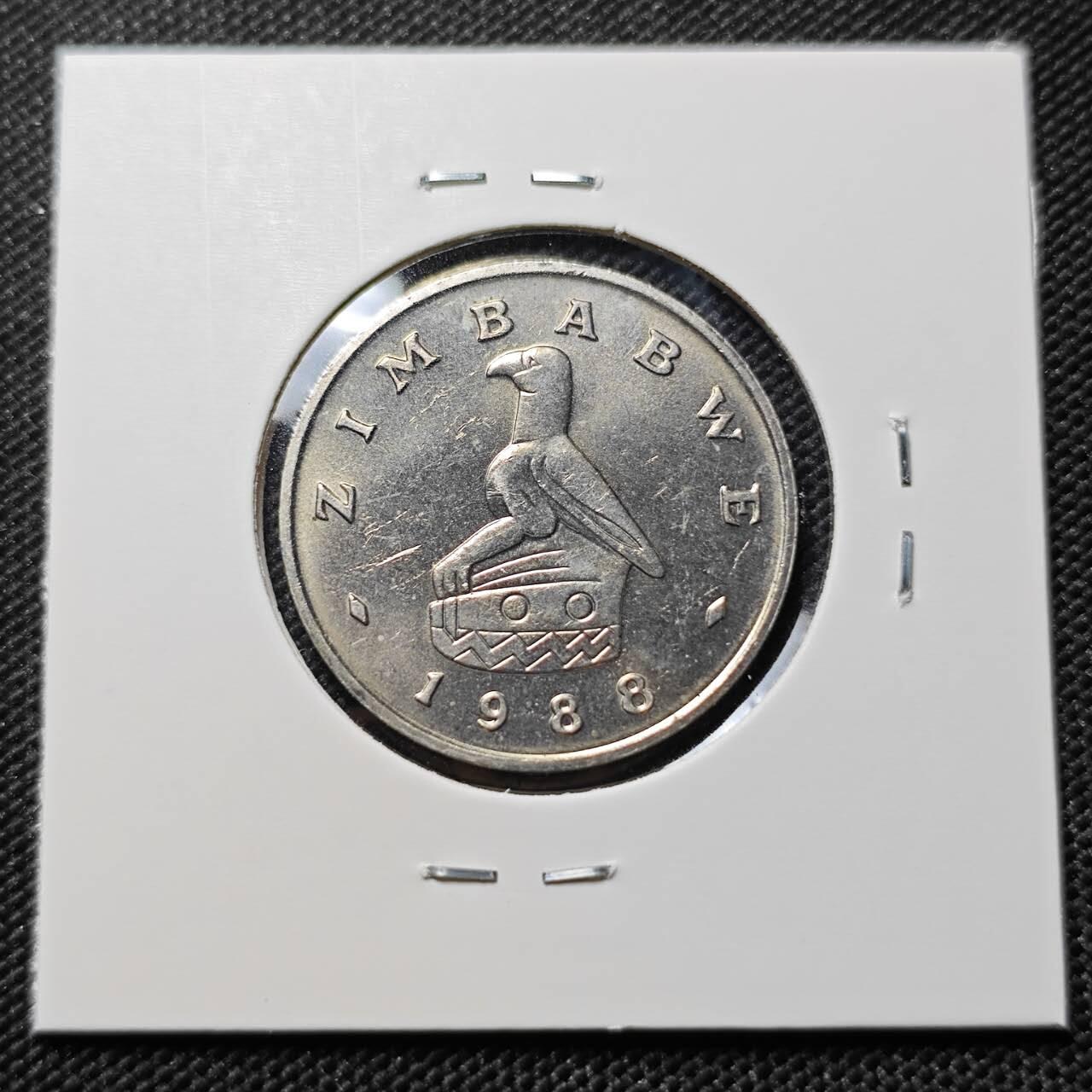 KK钱币收藏小铺  第387期  2月预留时间 周末发货 1988津巴布韦50分  好品