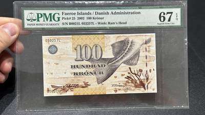 🎉🎉🎉《外钞收藏家》第六百期（年度庆典场）（本平台长期征集拍品、欢迎藏友们联系合作）❤️❤️❤️ - 法罗群岛2002年初版100克朗PMG67（全程无4，大西洋鳕鱼尾）