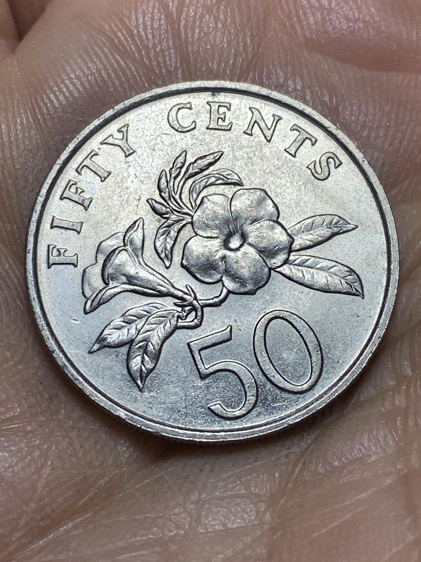 2026年第四场(总第一百七十三场）外国好品散币场(免佣金) 新加坡🇸🇬1987年50分(高盾哭脸齿边版)