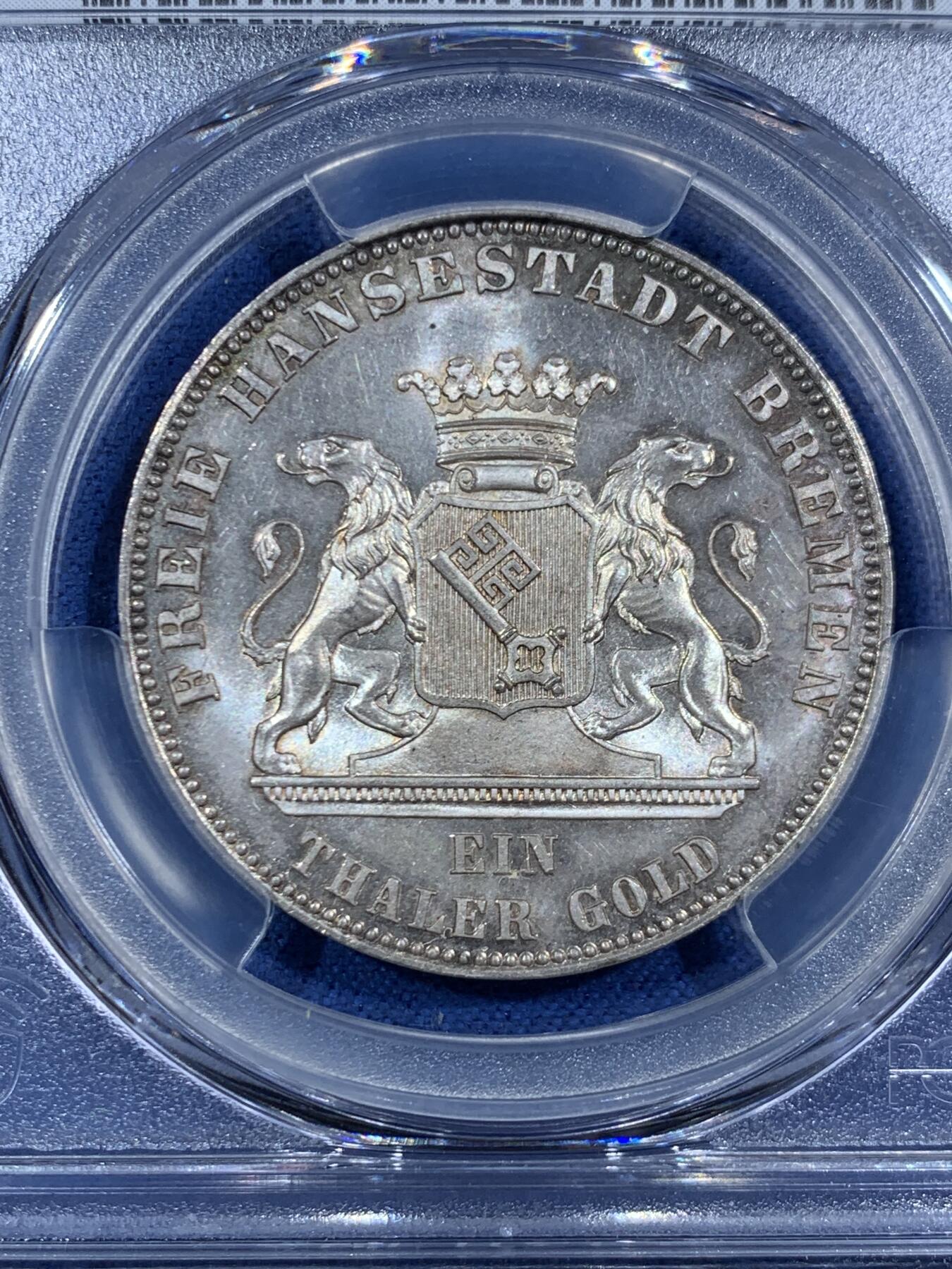 《竞宝斋》第455场 周日，周一 2场连拍 （全场包邮，欢迎送拍） PCGS MS65 德国1863年不莱梅自由市泰勒银币，正面为经典的双狮扶着象征不莱梅的钥匙盾徽，背面为纪念解放德国50周年文字。强烈转光，非常难得的Gem级别不莱梅银币。一枚66在最近Ha拍了近9000人民币。