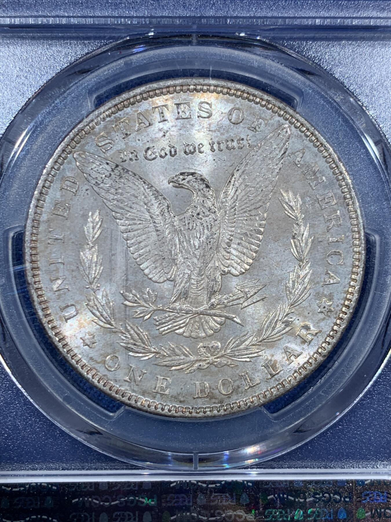 《竞宝斋》第455场 周日，周一 2场连拍 （全场包邮，欢迎送拍） PCGS MS65 美国1898年摩根一美元银币，1898年年份较少，本枚为标准卷首彩，美轮美奂，绚丽五彩，值得重新送评