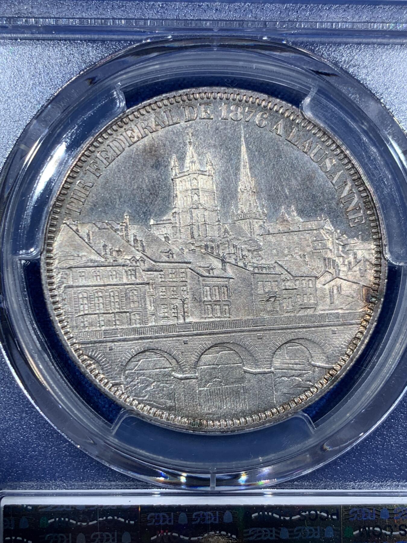 《竞宝斋》第455场 周日，周一 2场连拍 （全场包邮，欢迎送拍） PCGS MS63 瑞士1876年洛桑射击节大银币，设计最漂亮的射击节之一，背面为火热的城市景观。63中的佼佼者。