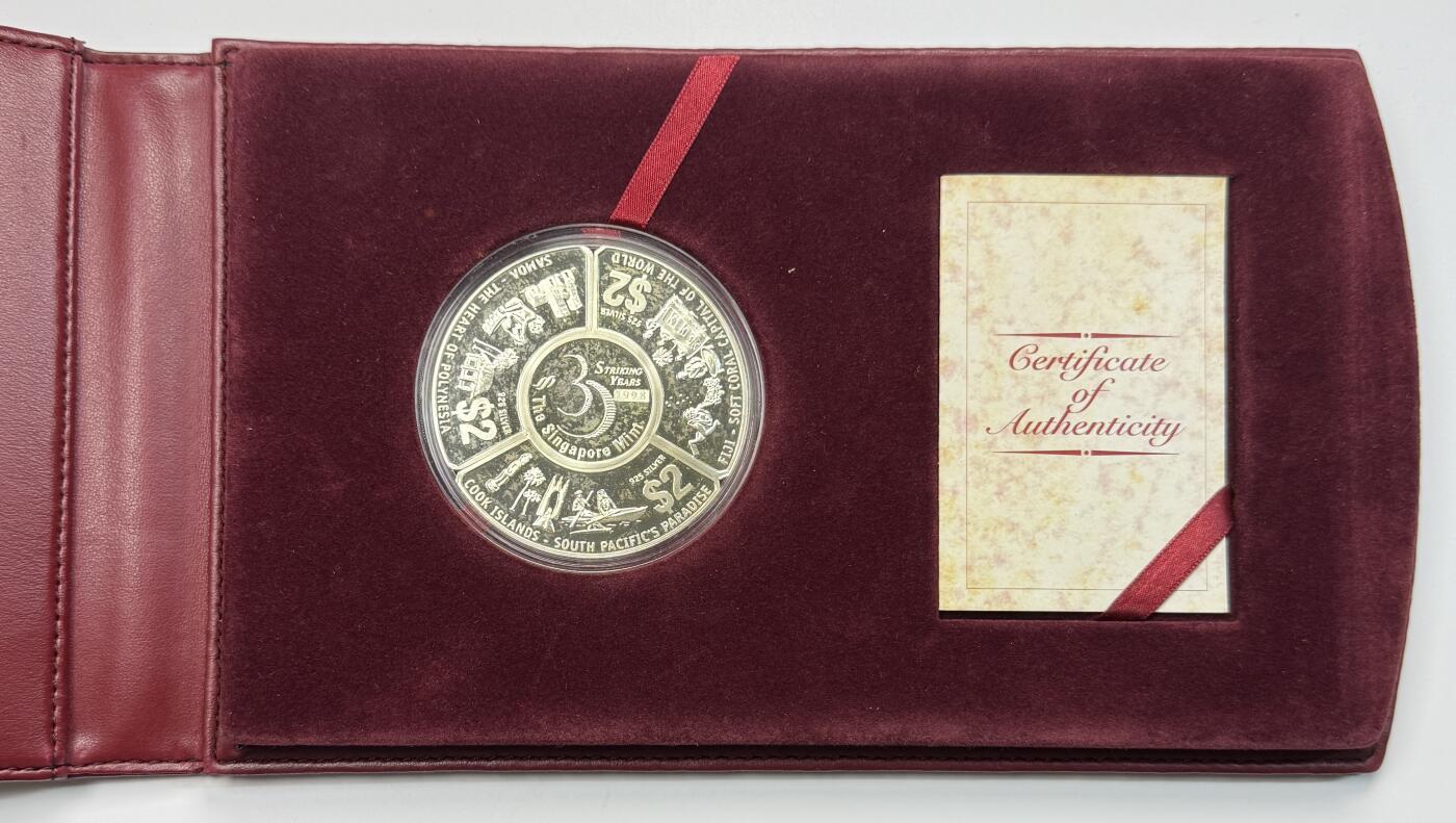 S&S Numismatic世界钱币-拍卖 第118期  获奖币*库克萨摩亚斐济1998年 新加坡造币厂30周年 2元精制纪念银币 盒证齐全 155.5克925银