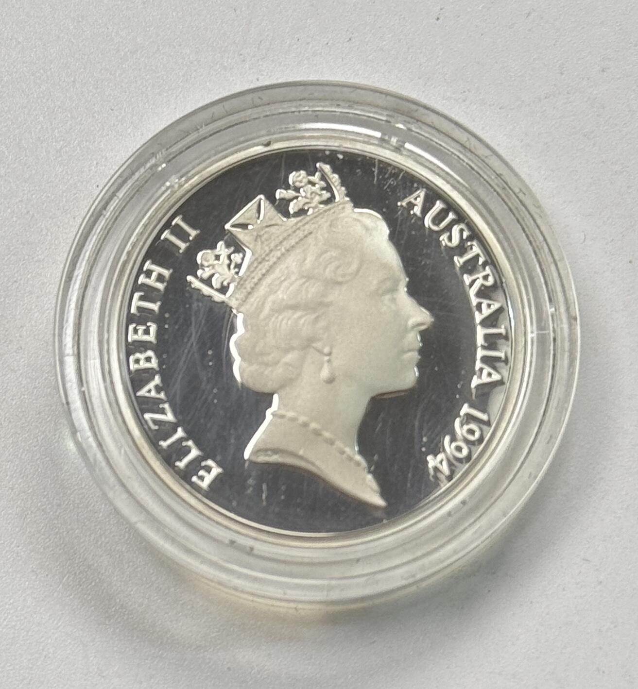 S&S Numismatic世界钱币-拍卖 第118期  澳大利亚1994年 澳元硬币发行十周年 1澳元精制纪念银币 盒证齐全 半边齿和全边齿2枚全套 11.49克925银/枚，品相如图