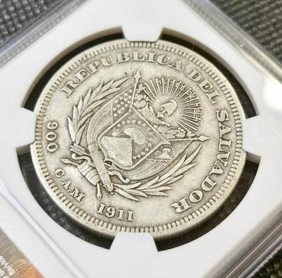 甄臻铺-世界币章拍卖（第46期）送拍享返佣金等优惠多多（1月10日精品场，敬请期待） NGC-VFD 1911年萨尔瓦多哥伦布1比索大银币，包浆醇厚