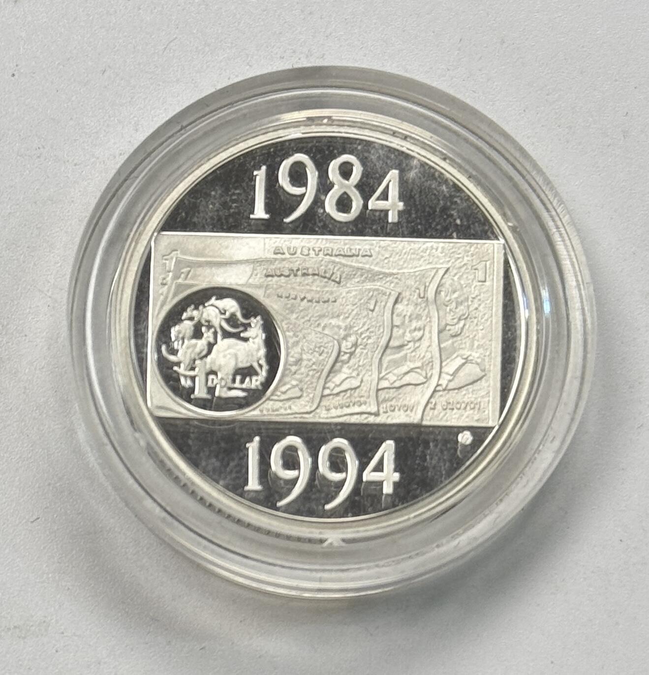 S&S Numismatic世界钱币-拍卖 第118期  澳大利亚1994年 澳元硬币发行十周年 1澳元精制纪念银币 盒证齐全 半边齿和全边齿2枚全套 11.49克925银/枚，品相如图