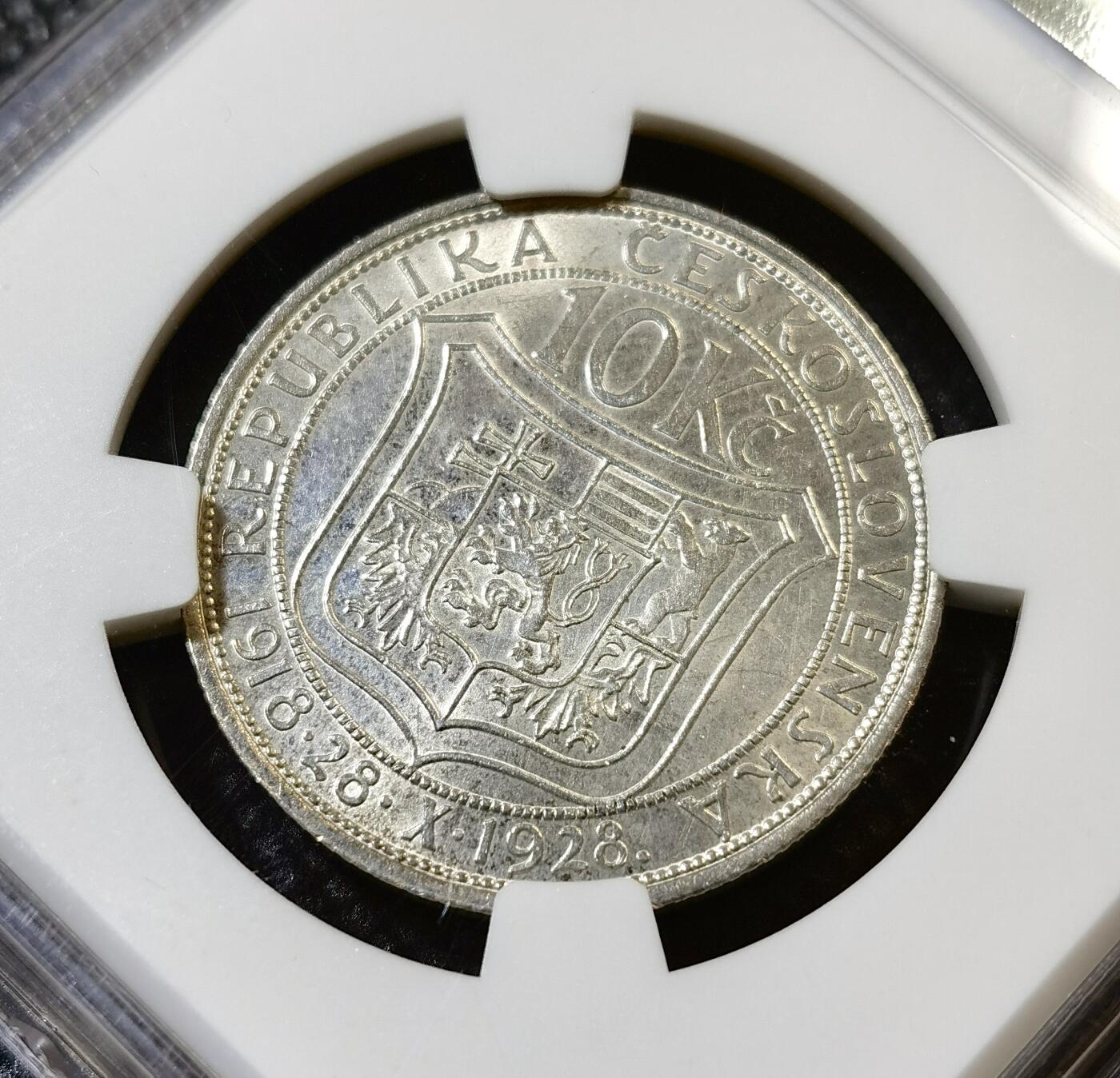 甄臻铺-世界币章拍卖（第46期）送拍享返佣金等优惠多多（1月10日精品场，敬请期待） NGC-UNCD 捷克斯洛伐克1928年10克朗银币 10克 700银