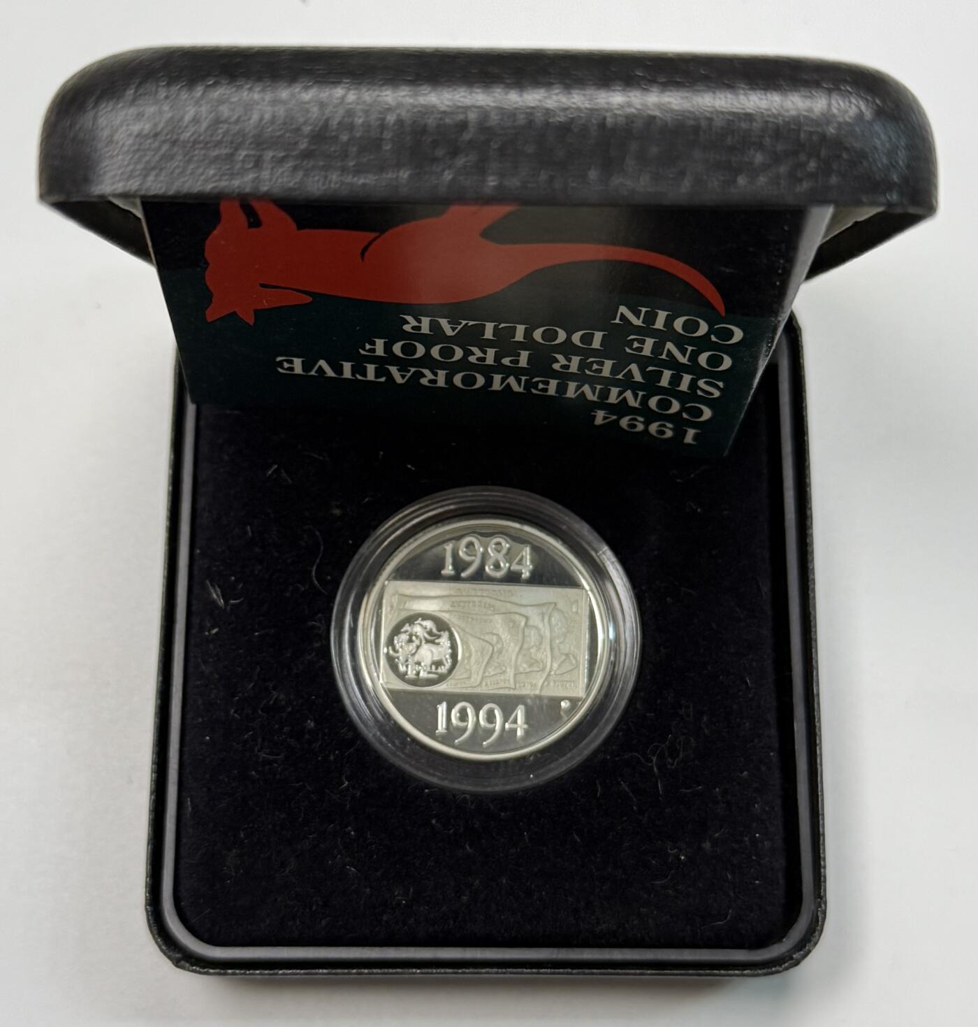 S&S Numismatic世界钱币-拍卖 第118期  澳大利亚1994年 澳元硬币发行十周年 1澳元精制纪念银币 盒证齐全 半边齿和全边齿2枚全套 11.49克925银/枚，品相如图