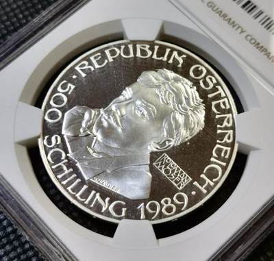 甄臻铺-世界币章拍卖（第46期）送拍享返佣金等优惠多多（1月10日精品场，敬请期待） NGC-PF69ULTRA CAMEO奥地利1989年知名画家科洛曼精致纪念币，NGC唯一冠军分！