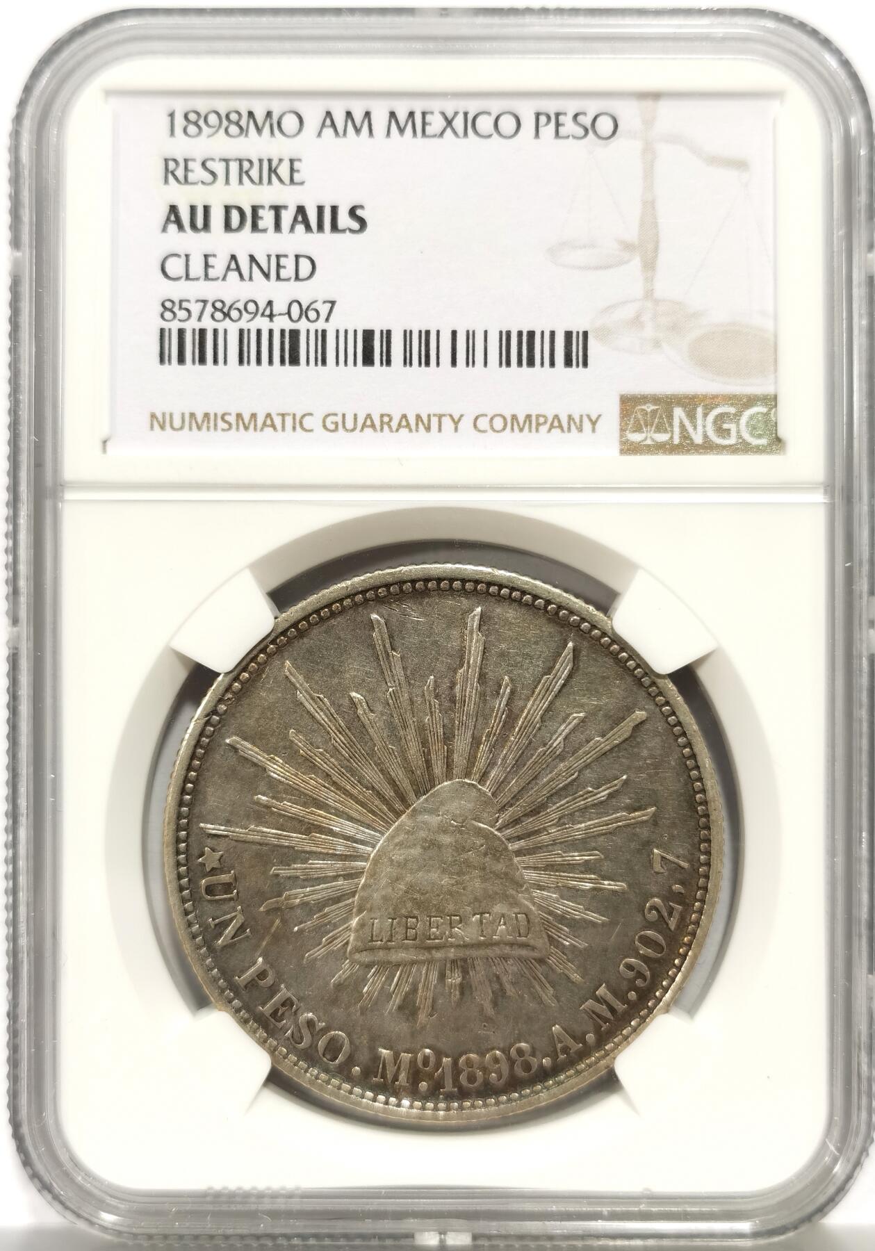 博洋堂世界钱币拍卖第156期（全场包邮） NGC AU 墨西哥1898年直边鹰洋，1949年版用作国府军队军饷流通，阳光下五彩包浆非常漂亮，底板完美带光，鹰羽毛清晰分明，UNC品相低评了，通货老鹰都要四百了