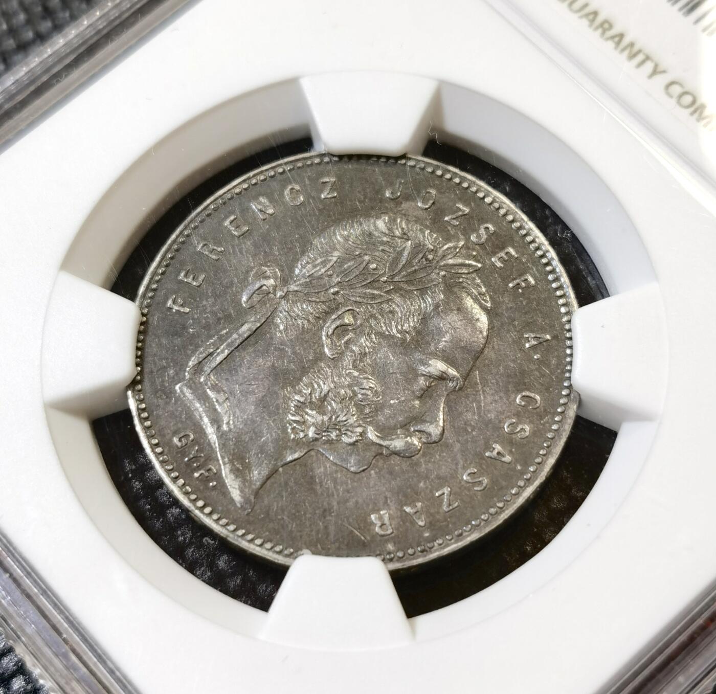 甄臻铺-世界币章拍卖（第46期）送拍享返佣金等优惠多多（1月10日精品场，敬请期待） NGC-AU50 奥匈帝国匈牙利1869年1福林银币 双天使扶冠版 此银币只发行了1868和1869两年，非常稀少！