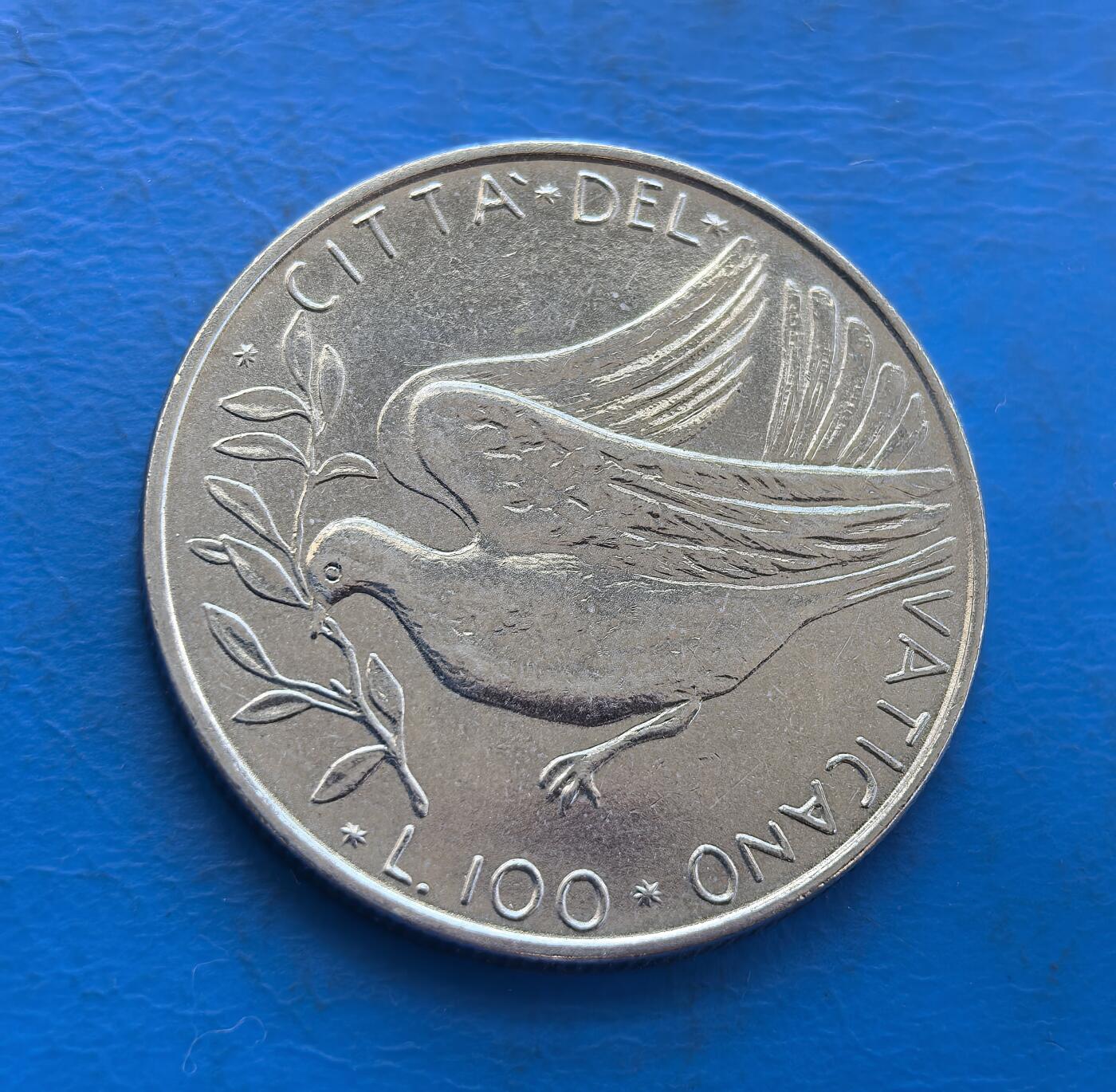 外国优质银币非洲美洲币，周六九点倒数截拍，满百包邮，持续收拍 梵蒂冈 和平鸽100 里拉币，正面绘衔橄榄枝的和平鸽 +“CITTA DEL VATICANO”，背面展教皇纹章（双钥、盾形），兼具宗教文化标识与和平符号，收藏主题独特。