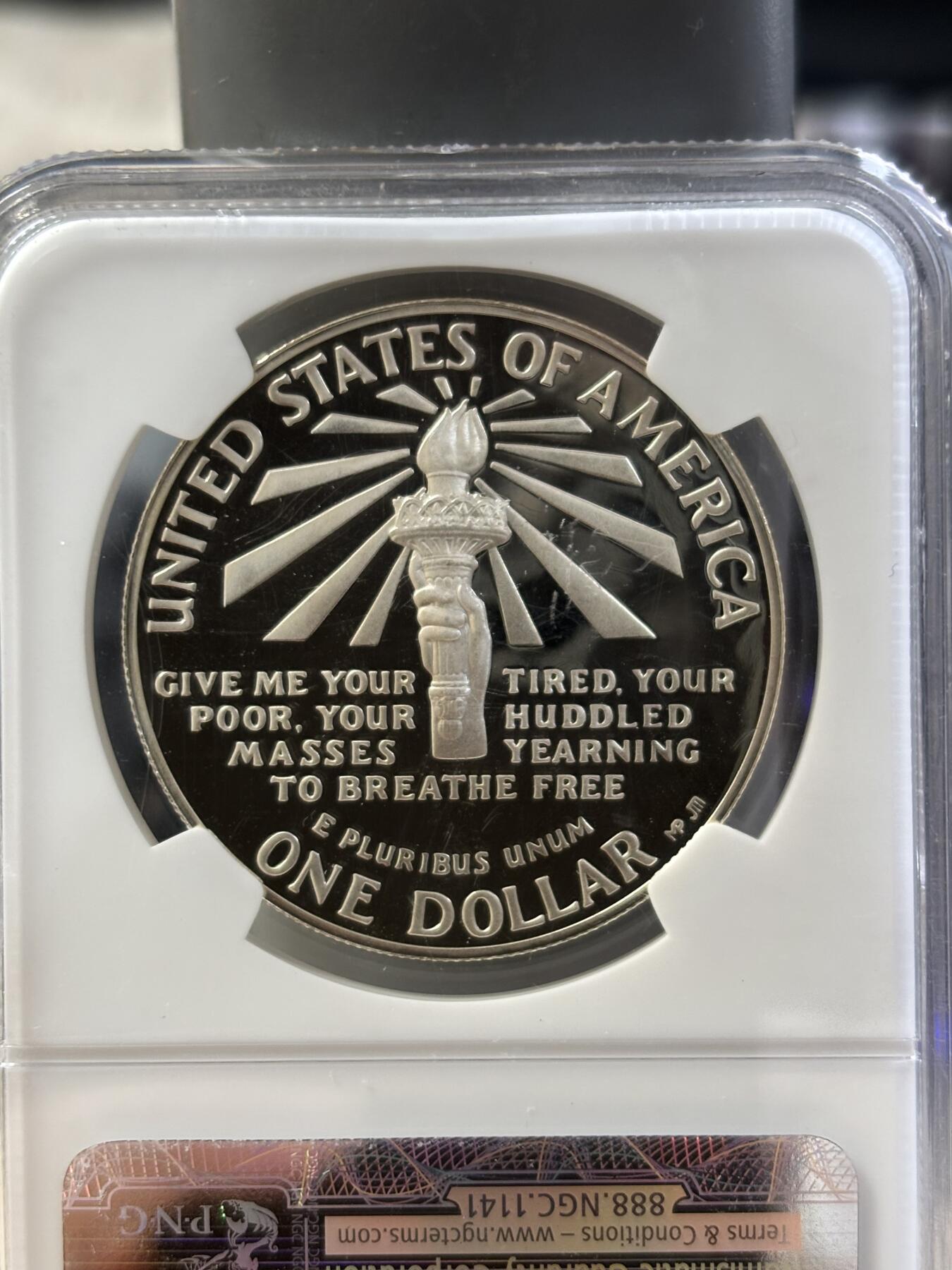 第187期拍卖 获奖币美国1986年自由女神百年精制纪念银币NGC-PF69，26.72克，900银