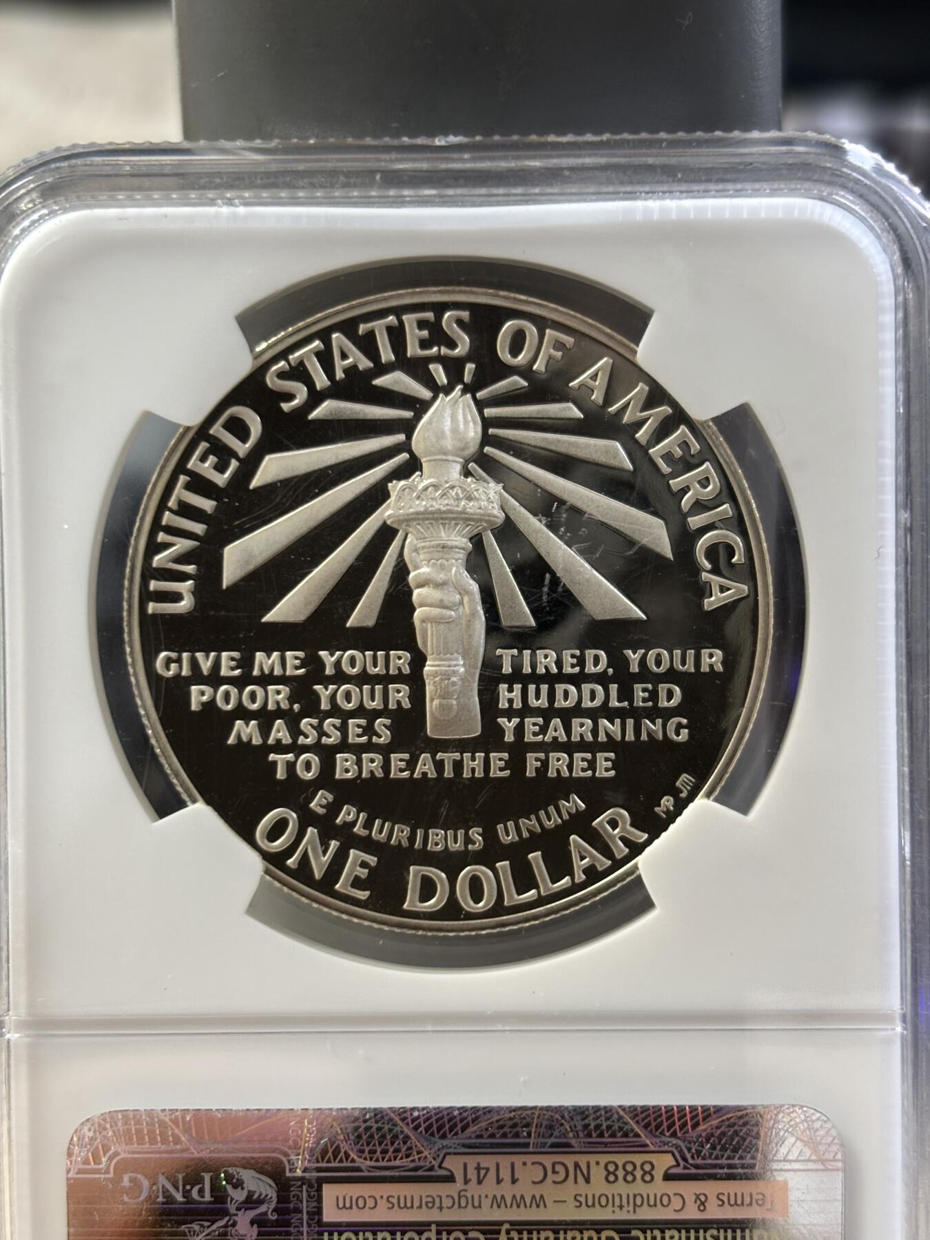 第187期拍卖 获奖币美国1986年自由女神百年精制纪念银币NGC-PF69，26.72克，900银