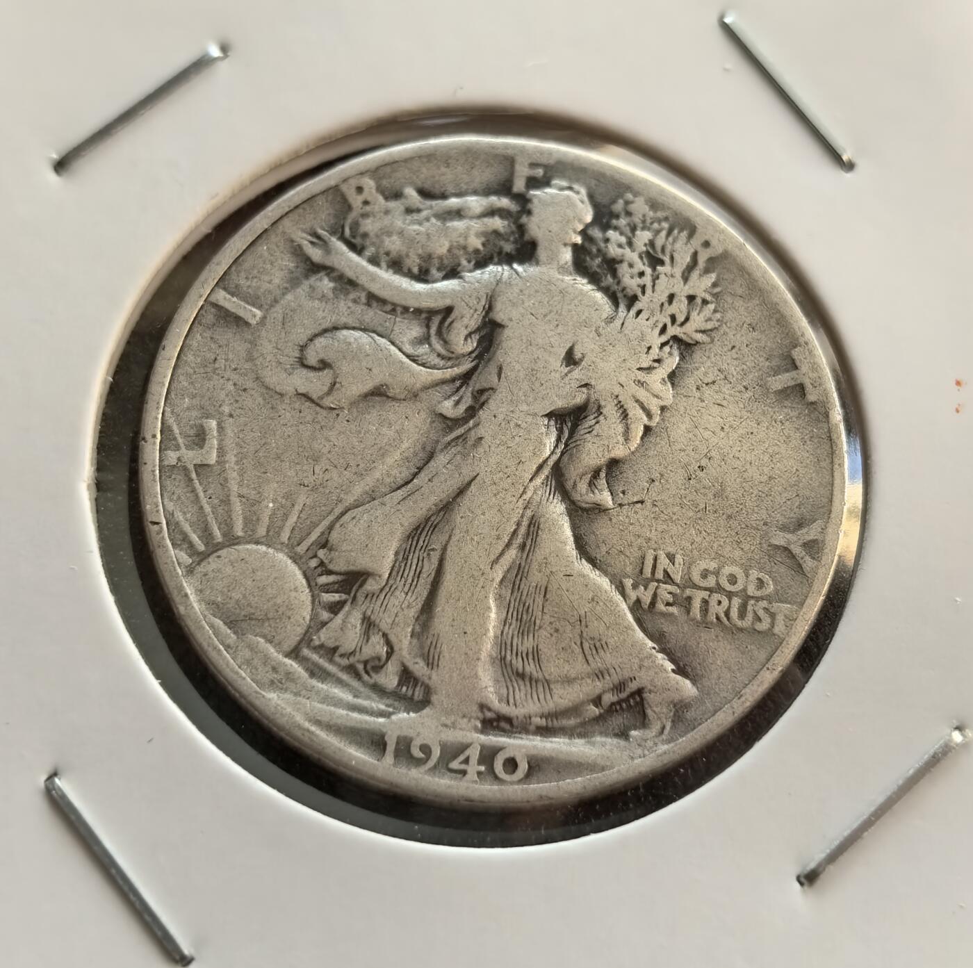 外国优质银币非洲美洲币，周六九点倒数截拍，满百包邮，持续收拍 美国1940 年行走自由女神半元银币，正面女神伴旭日纹，背面立鹰配 “合众为一” 格言，属二战时期币，版式经典、历史属性强，是美币收藏热门品。