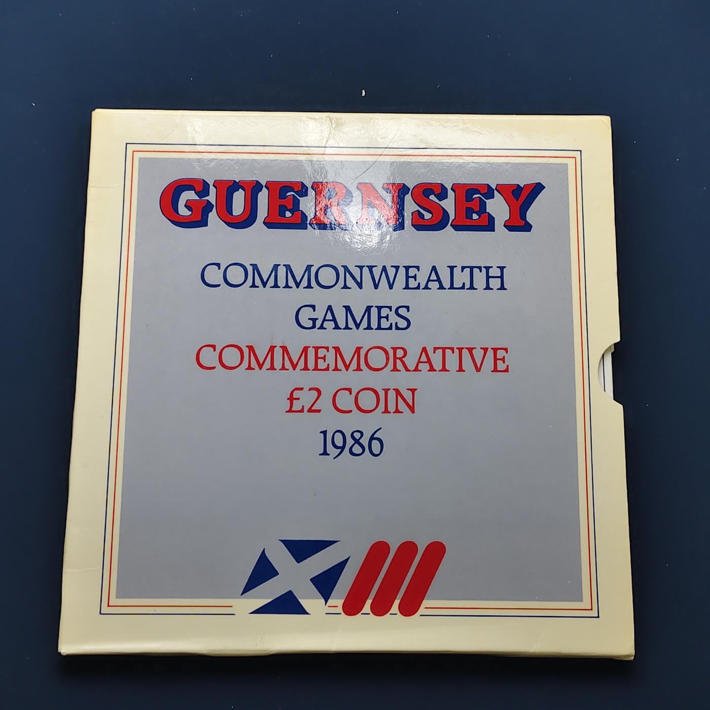 【全场包邮】纯粹捡漏拍492场【封装套币专场】-注意佣金 根西1986年2镑爱丁堡英联邦运动会官方卡装克朗型纪念币