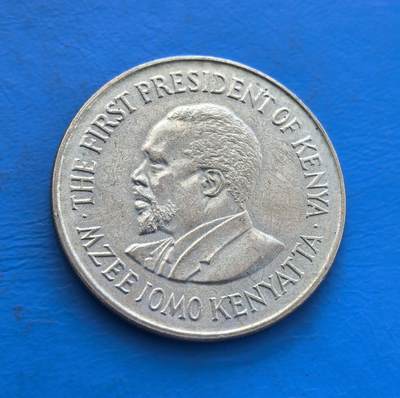 外国优质银币非洲美洲币，周六九点倒数截拍，满百包邮，持续收拍 - 肯尼亚1973 年 1 先令纪念币，正面是首任总统肯雅塔像，背面展国徽（双狮护盾 +“团结” 标语），属肯尼亚独立后纪念币，风格体现其国家领袖与标识，具东非货币收藏价值。