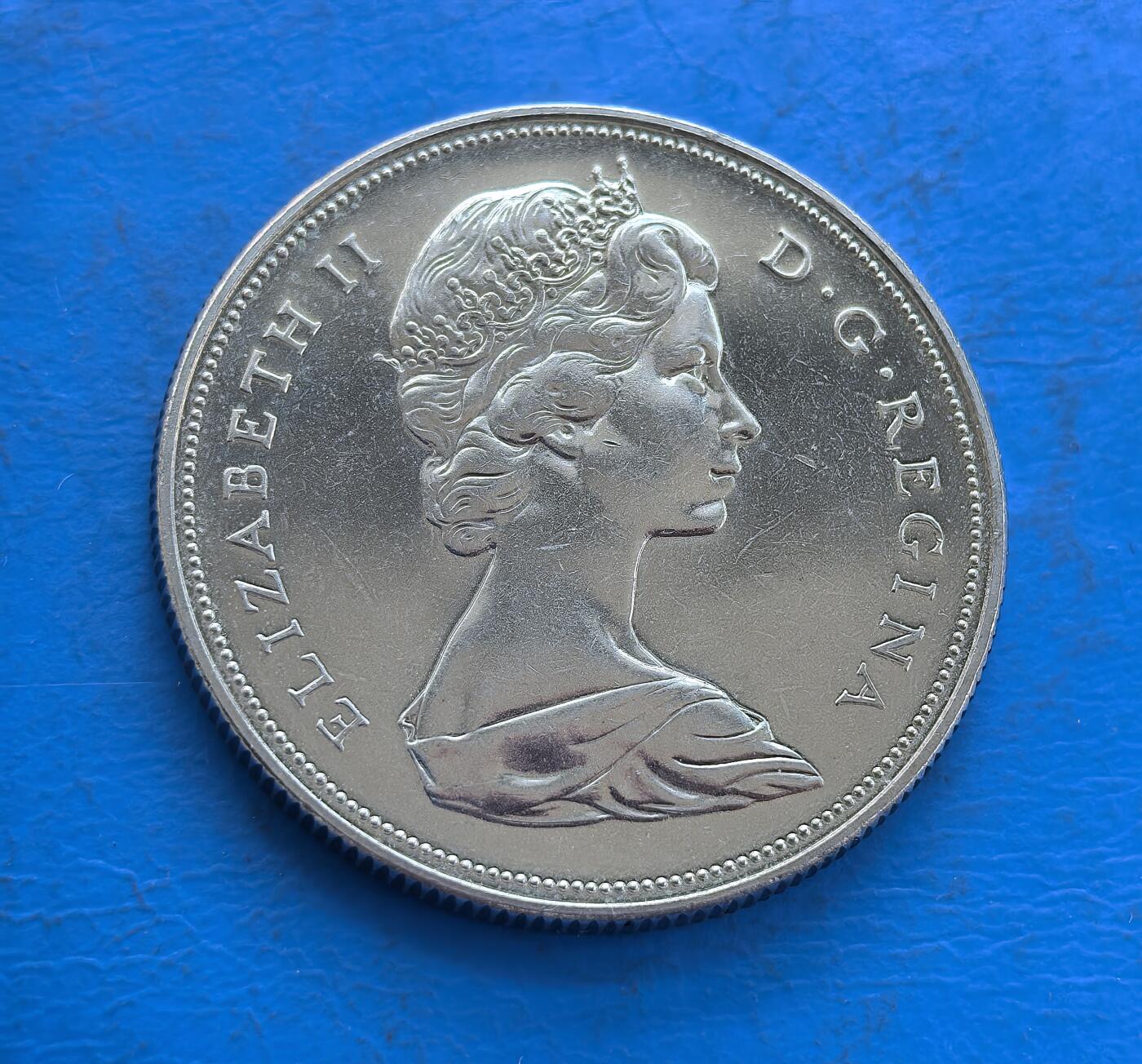 外国优质银币非洲美洲币，周六九点倒数截拍，满百包邮，持续收拍 加拿大1970年曼尼托巴省纪念币，正面是伊丽莎白二世像，背面饰曼尼托巴省省花（草原百合），纪念该省建省百年，币面工艺精细，兼具地域文化与收藏价值