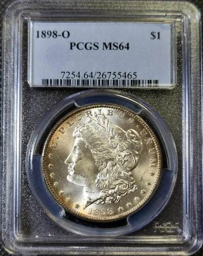 “甄选寰宇 · 臻藏岁华”新年精品场（直播拍卖）-甄臻铺-世界币章拍卖（第47期）送拍享返佣金等优惠多多 - PCGS-MS64 美国1898年O版摩根一元银币，发行量少，带黄油光环彩