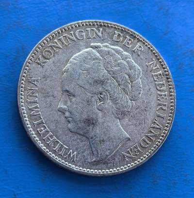 外国优质银币非洲美洲币，周六九点倒数截拍，满百包邮，持续收拍 - 荷兰  1929 年1 盾银币10克纯银价130元，饰威廉明娜女王像与国徽狮纹，属荷属时期币，带自然包浆，存世量少，是荷兰殖民时代货币代表，兼具王室题材与收藏稀缺性。