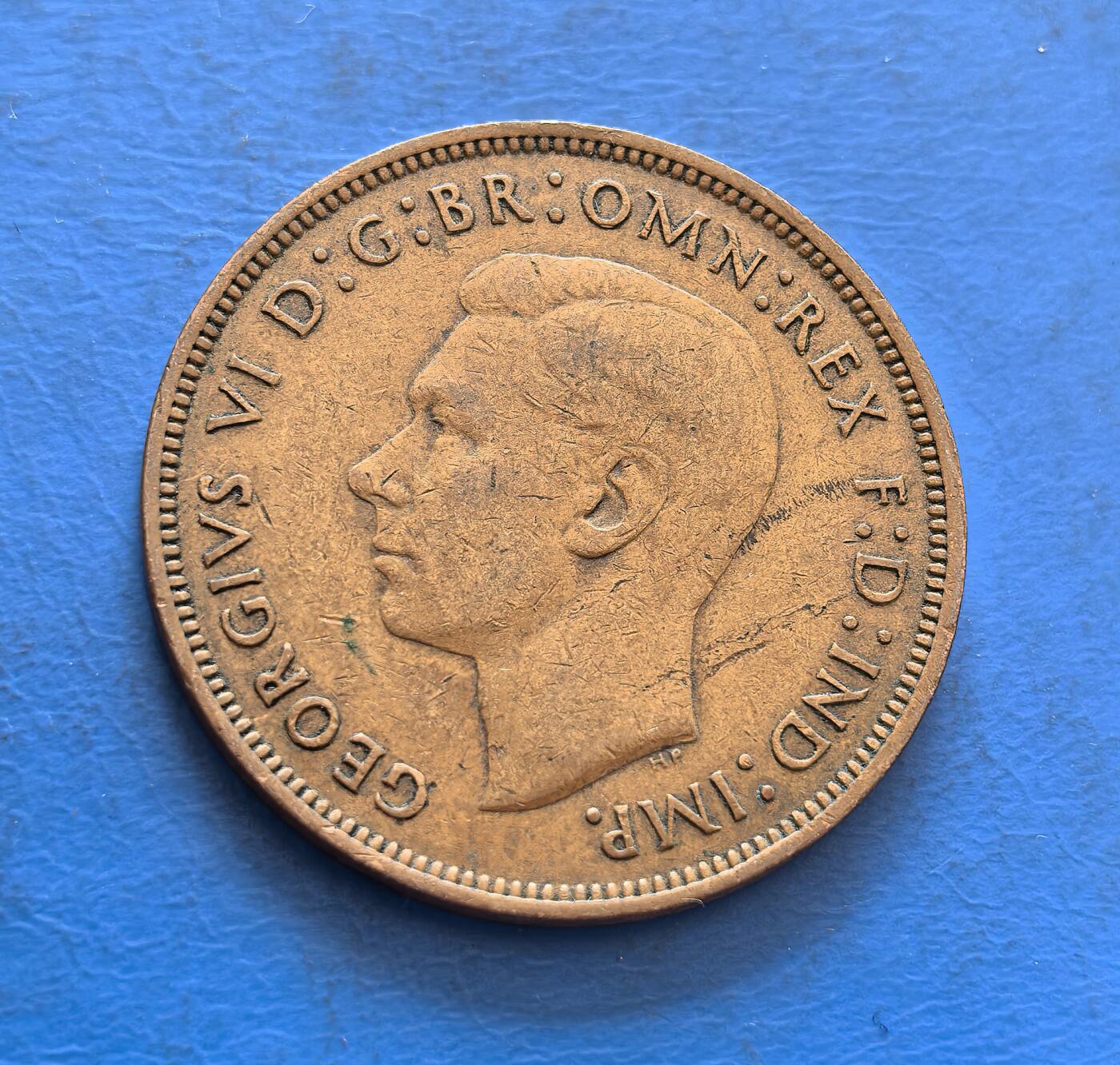 外国优质银币非洲美洲币，周六九点倒数截拍，满百包邮，持续收拍 英国1945 年乔治六世 1 便士铜币，正面印国王头像 + 君主标识，背面展持三叉戟的不列颠女神像，承载二战末期英国货币文化，兼具君主纪念与国家符号收藏价值。