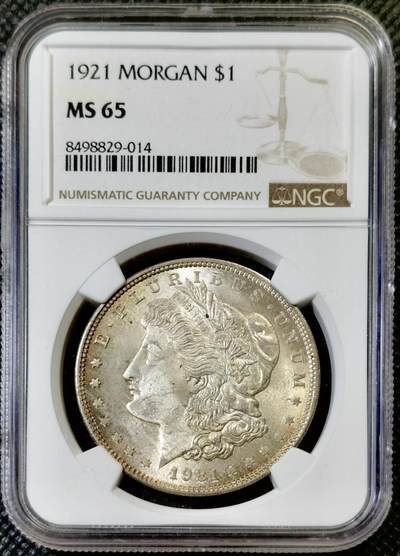 “甄选寰宇 · 臻藏岁华”新年精品场（直播拍卖）-甄臻铺-世界币章拍卖（第47期）送拍享返佣金等优惠多多 - NGC-MS65，美国1921年1美元银币，摩根银元，原味淡彩，包浆极美。BU收藏级，完全未流通的崭新出厂状态